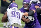 Vikings right tackle Brian O’Neill blocked against defensive end Danielle Hunter during the second day of training camp Thursday.