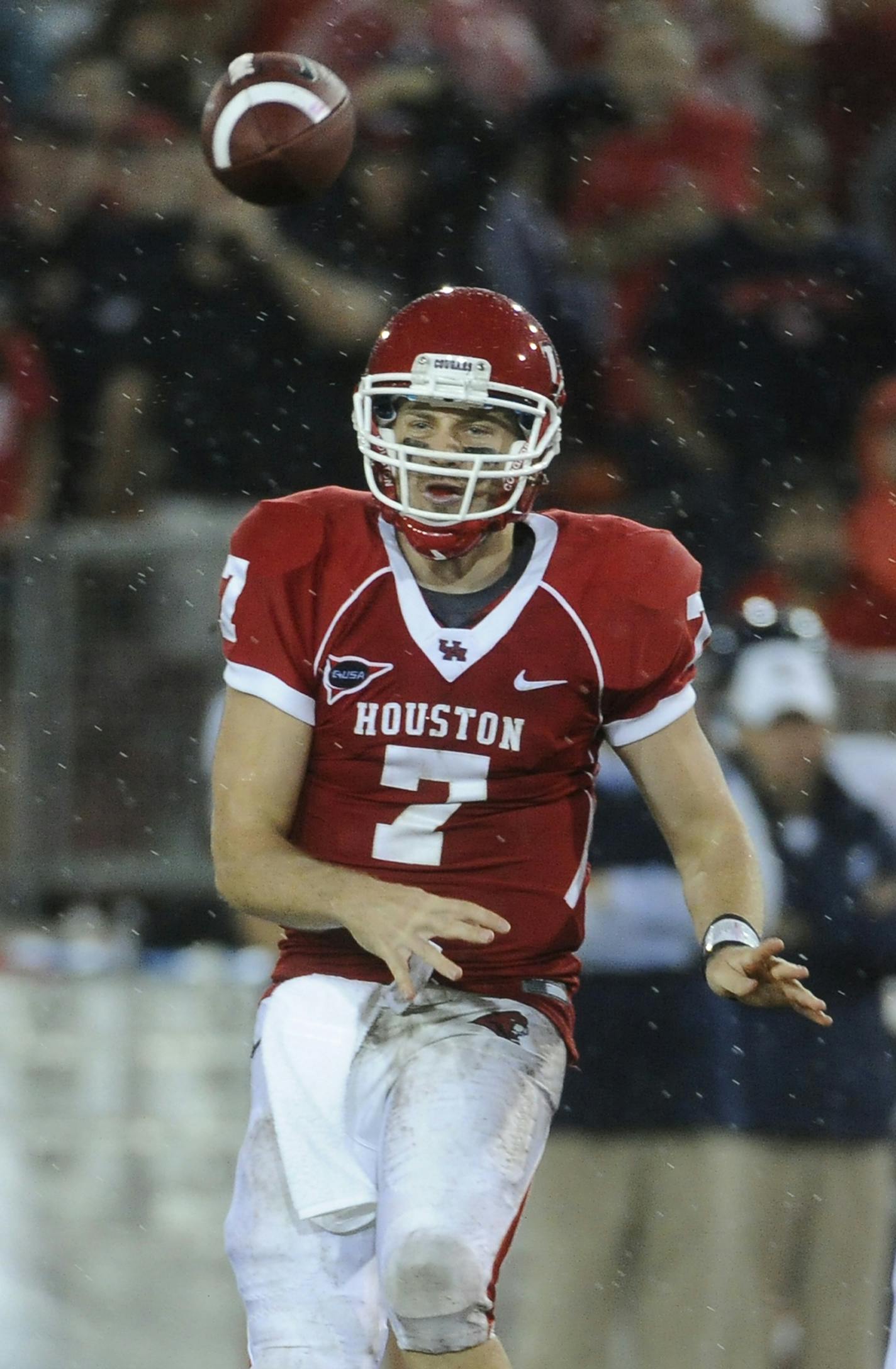 Houston quarterback Case Keenum throws a pass during the second half of an NCAA college football game against Rice on Thursday, Oct. 27, 2011, in Houston. Houston won 73-34. (AP Photo/Pat Sullivan)