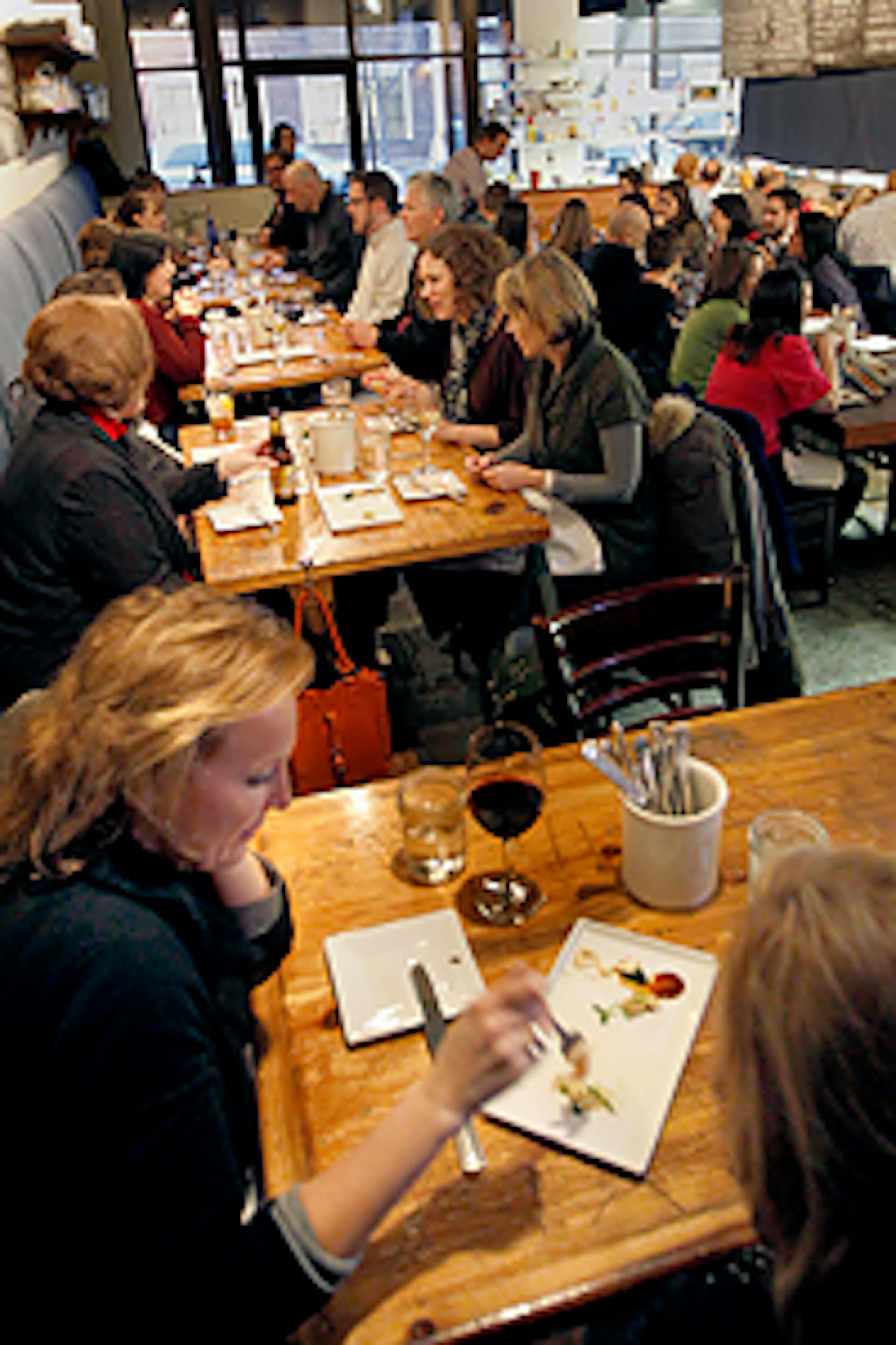 Diners enoying the tasting menu at Travail