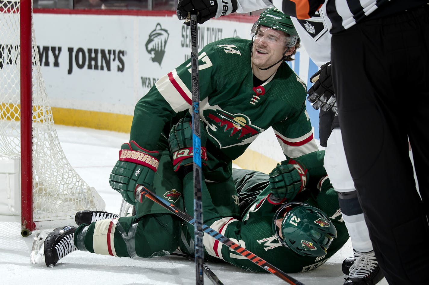 Marcus Foligno (17) and Eric Fehr (21) celebrated a goal by Fehr in the first period. ] CARLOS GONZALEZ &#xef; cgonzalez@startribune.com &#xf1; October 25, 2018, St. Paul, MN, Xcel Energy Center, NHL, Minnesota Wild vs. Los Angeles Kings