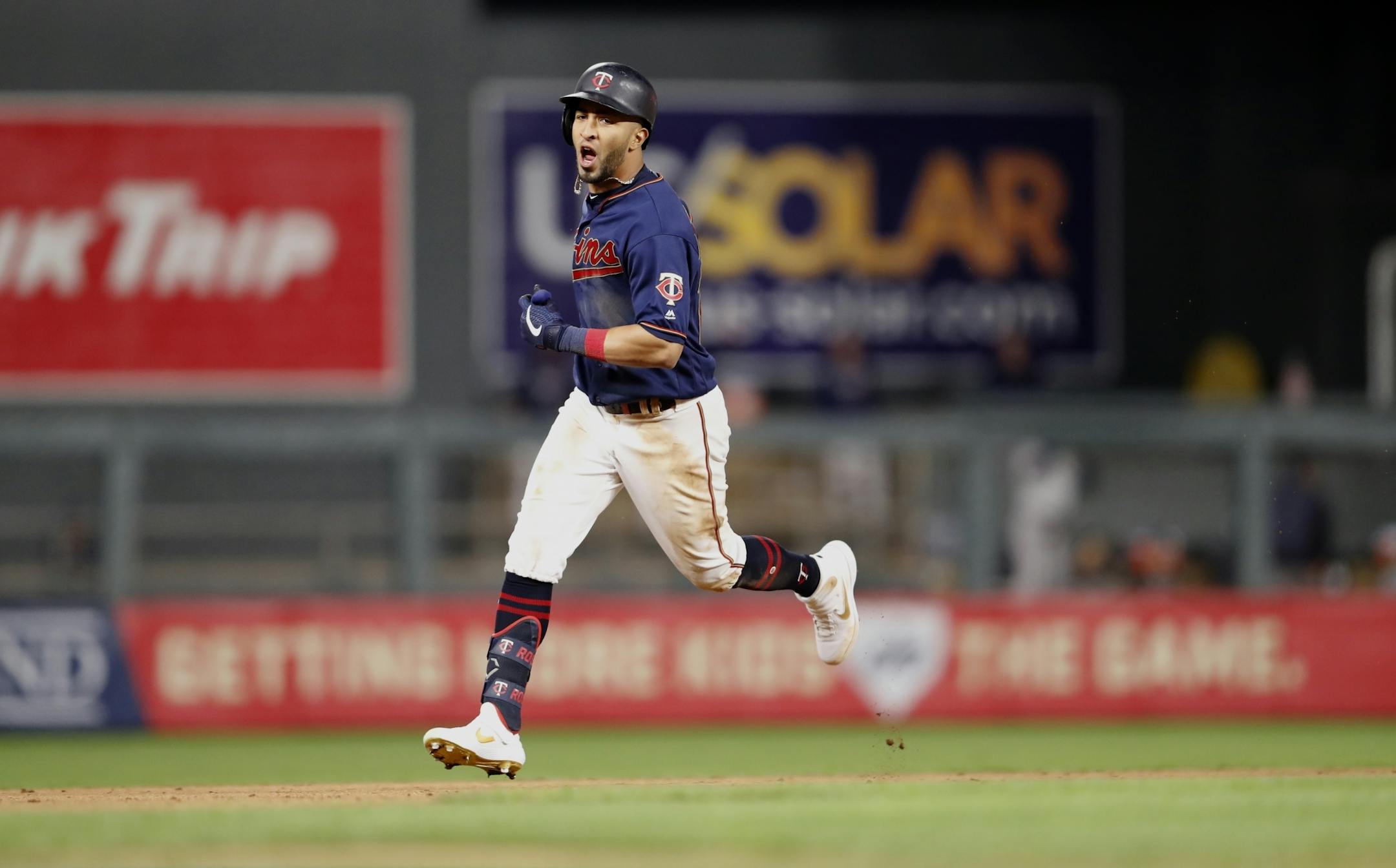 Minnesota Twins right fielder Eddie Rosario (20) rounded the bases after hitting a solo home run in the eighth inning.