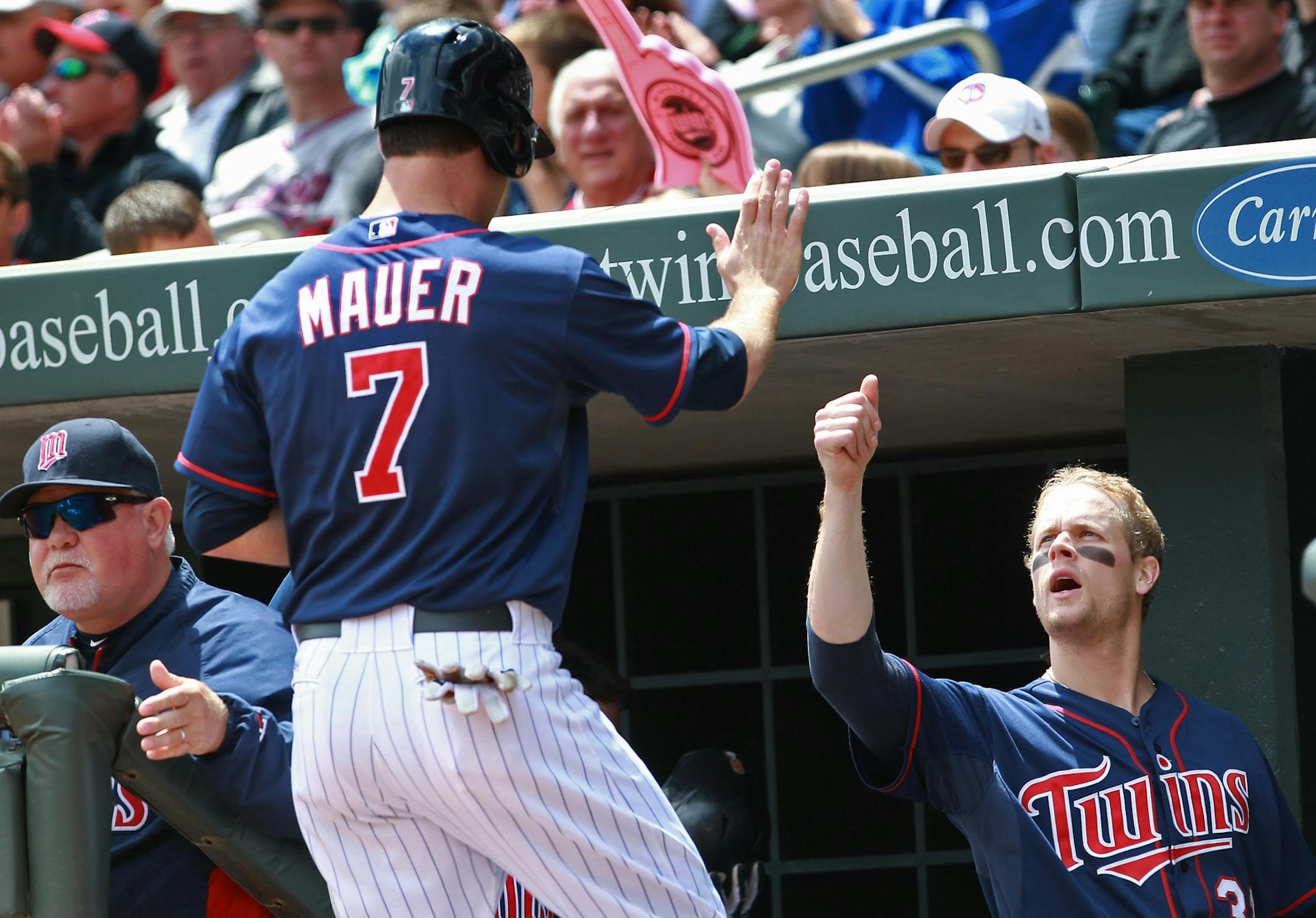 Joe Mauer (left), Justin Morneau