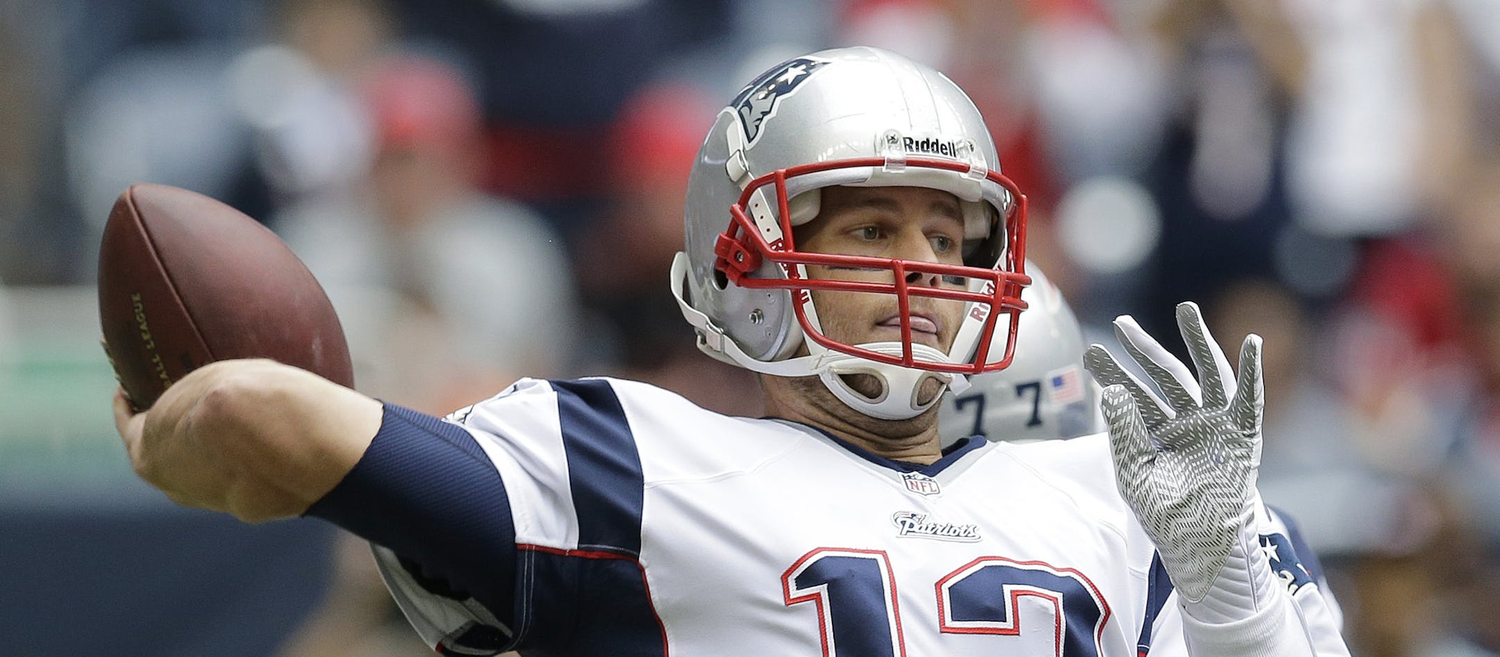 New England Patriots' Tom Brady throws against the Houston Texans during the first quarter of an NFL football game Sunday, Dec. 1, 2013, in Houston. (AP Photo/Patric Schneider)