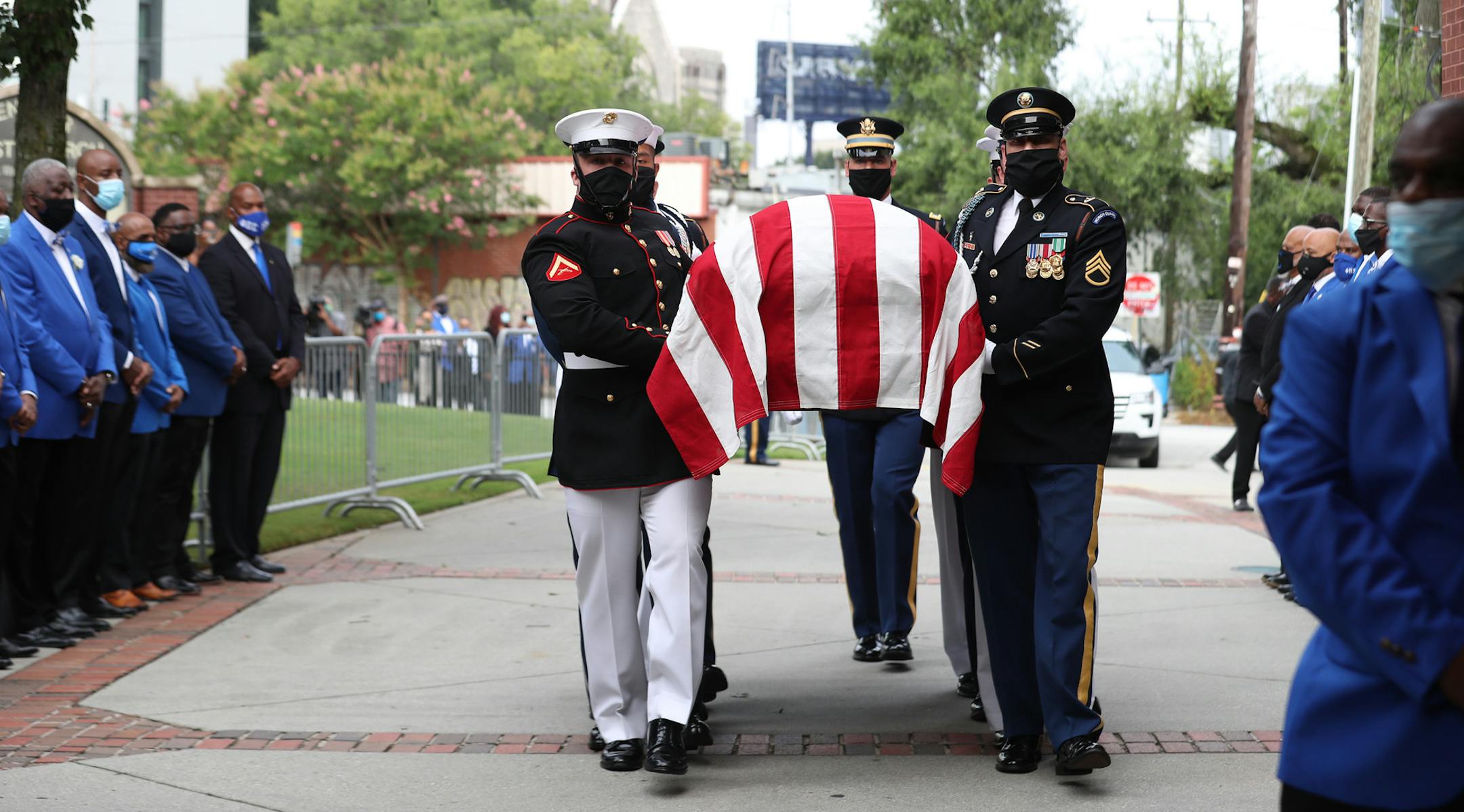 An Honor Guard carries the casket of Rep. John Lewis into Ebeneezer Baptist Church on July 30, 2020 in Atlanta, Georgia. On the sixth day of the "Celebration of Life" for Rep. John Lewis, after traveling via motorcade from the Georgia state Capitol where he was lying in state overnight, his funeral is to be held at Ebeneezer Baptist Church in Atlanta, with burial to follow. (Alyssa Pointer/Atlanta Journal-Constitution/TNS) ORG XMIT: 1729152