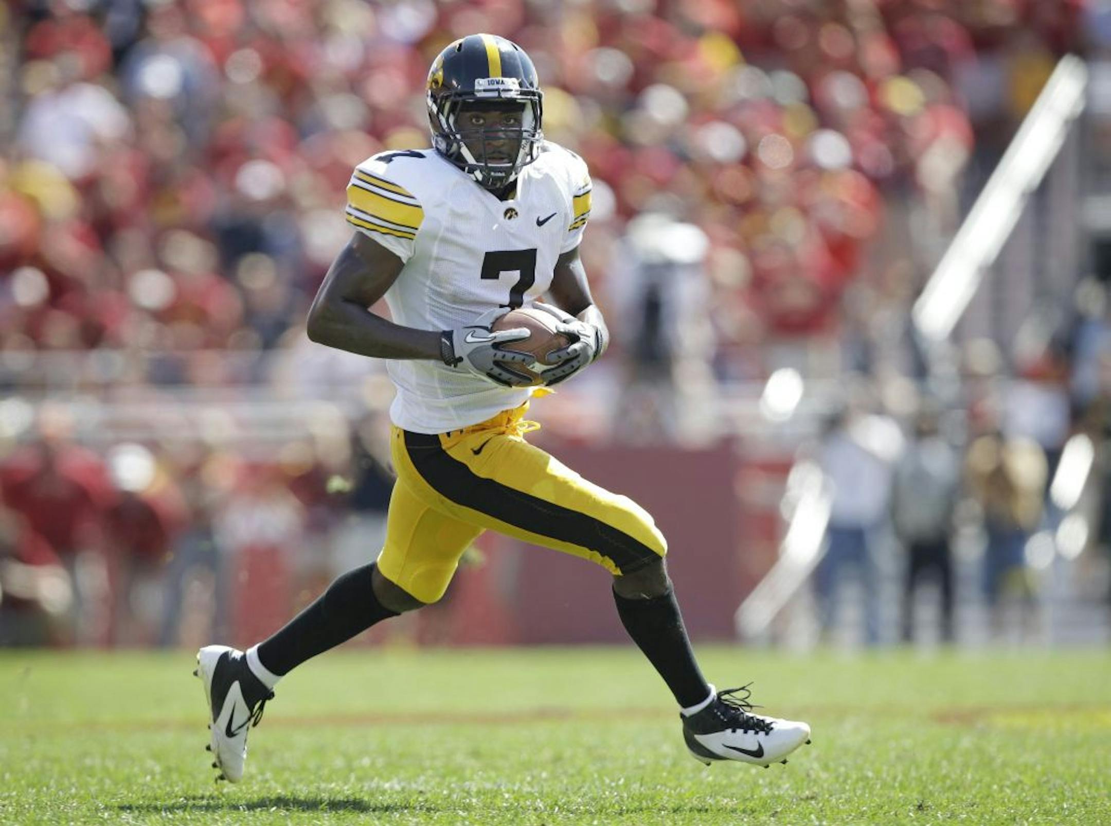 Iowa wide receiver Marvin McNutt runs after catching a pass during the second half of an NCAA college football game against Iowa State, Saturday, Sept. 10, 2011, in Ames, Iowa. Iowa State won 44-41 in overtime.