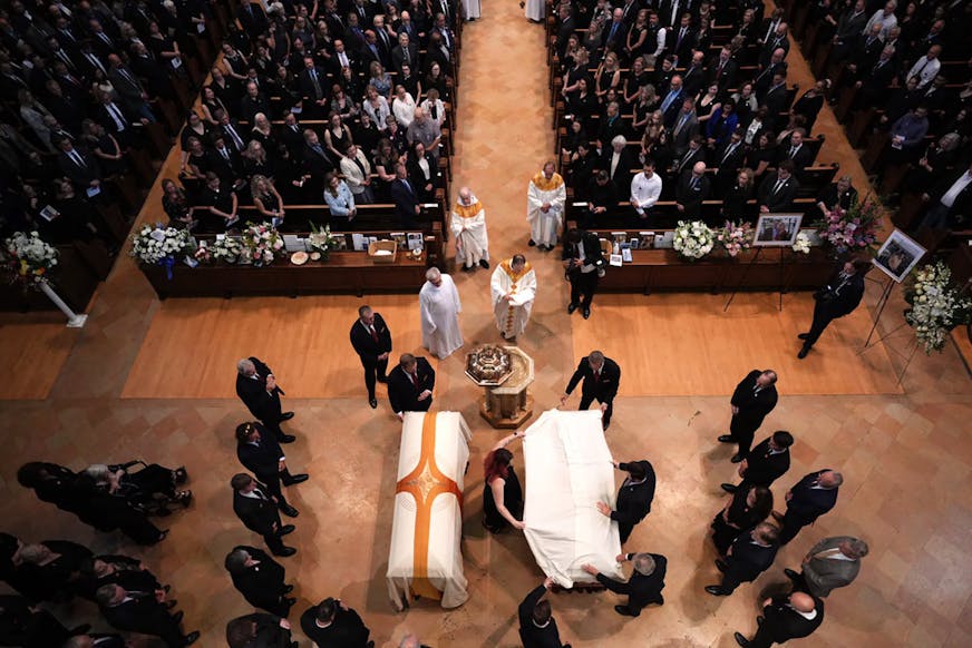 The caskets of Melissa Hortman, left, and Mark Hortman before the procession down the aisle of the sanctuary during funeral services at the Basilica of St. Mary in Minneapolis on June 28.