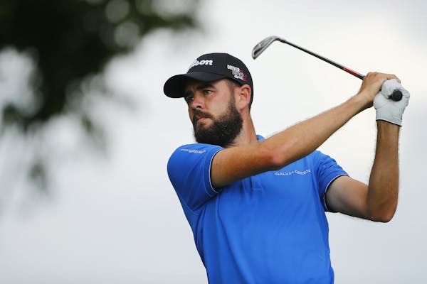 Troy Merritt tees off on the third hole during the third round of the PGA Tour's Barbasol Championship golf tournament at Keene Trace Golf Club in Nic
