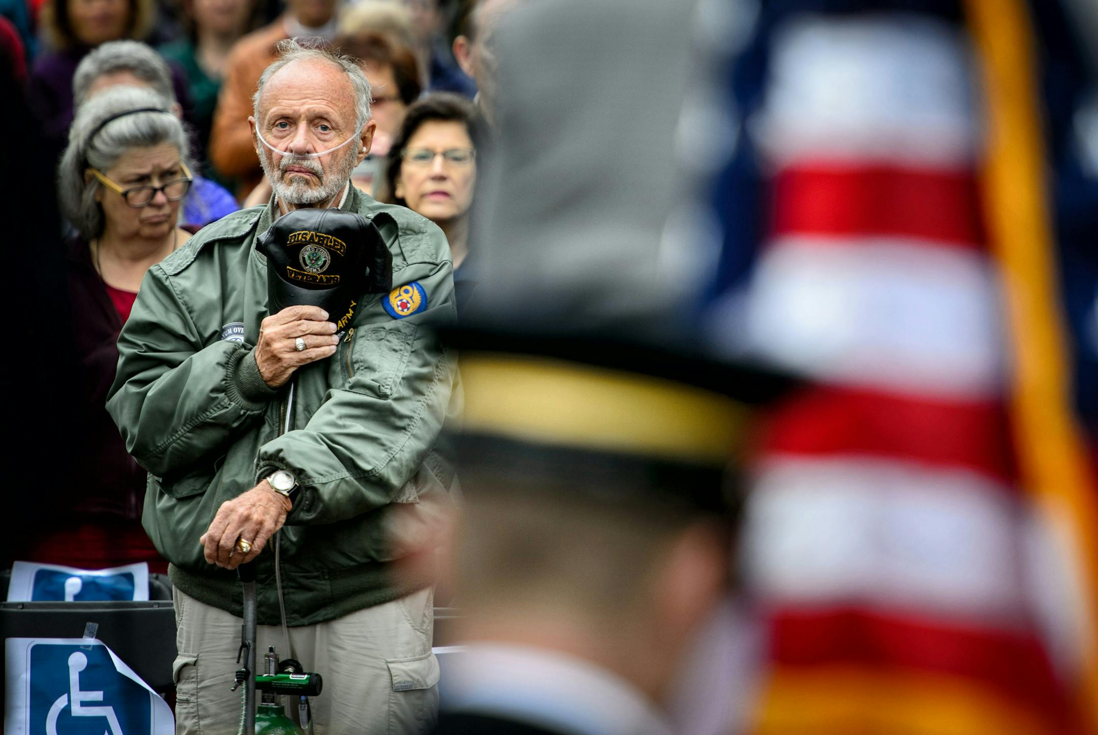 Richard Strom, a Korean War veteran, held his hat over his heart as the 133rd National Guard Honor Guard posted the colors. He said he comes every year but this is likely his last time because of his failing health. ] GLEN STUBBE * gstubbe@startribune.com , Monday, May 25, 2015 Traditional Memorial Day ceremony held near the Soldiers Memorial monument at Lakewood Cemetery, Minneapolis.