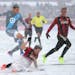 Minnesota United played its first home game in 2017 in the snow at TCF Bank Stadium. Loons forward Christian Ramirez and Atlanta United defender Micha