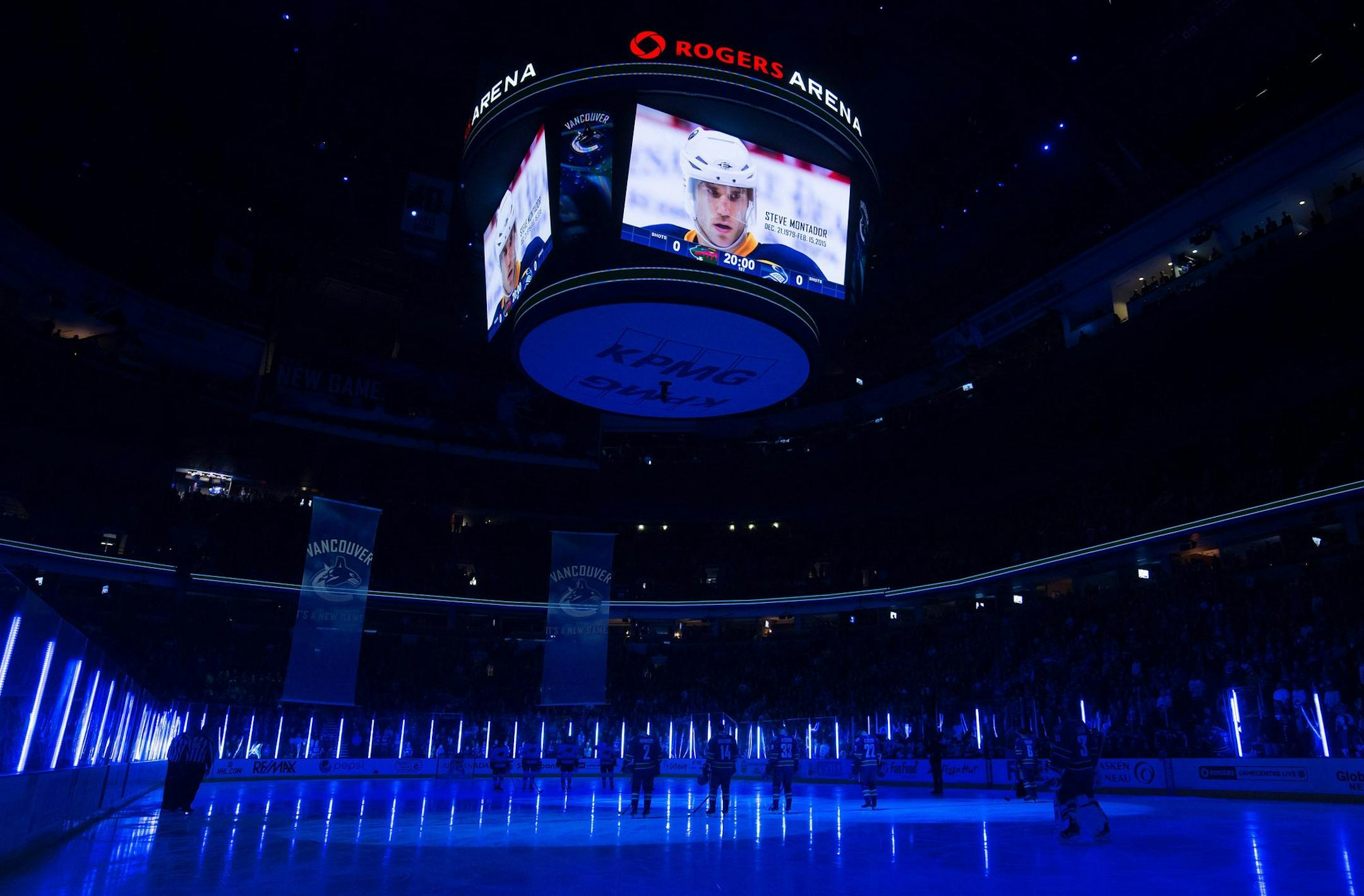 Wild and Canucks players stood for a moment of silence Monday night in memory of Vancouver-born former NHL player Steve Montador, 35, who was found dead at his home Sunday.