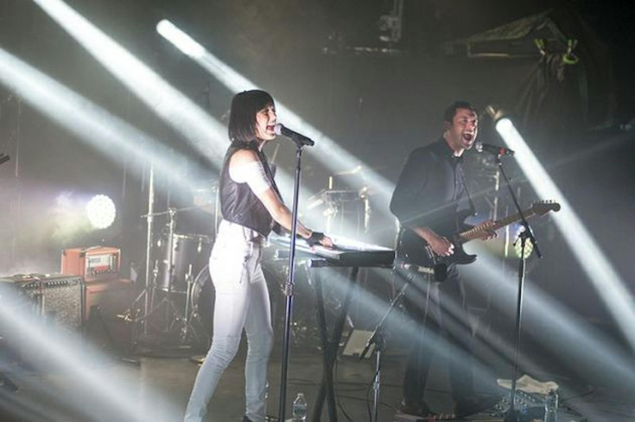 Sarah Barthel and Josh Carter played under a bank of thin spotlights and in front of a packed crowd at Sunday's sold-out Phantogram concert at First Avenue. / Photos by Leslie Plesser