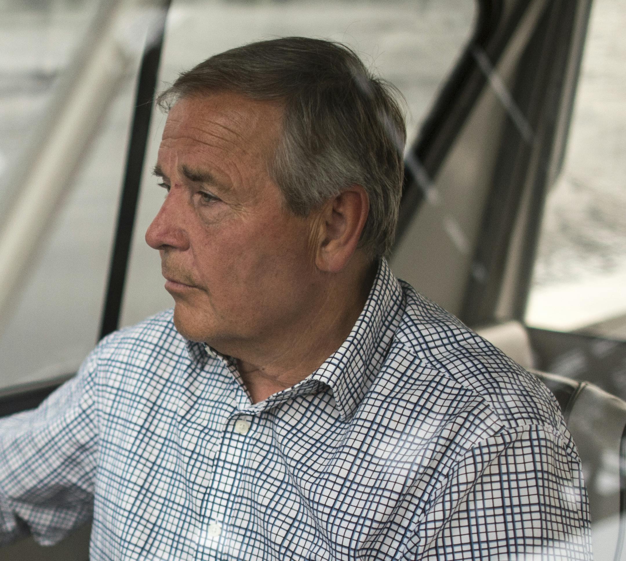 Ranier Mayor Dennis Wagner navigated his boat beneath a rising lift bridge on Rainer Lake in early June. ] Aaron Lavinsky • aaron.lavinsky@startribune.com Story on Ranier Mayor and businessman Dennis Wagner.