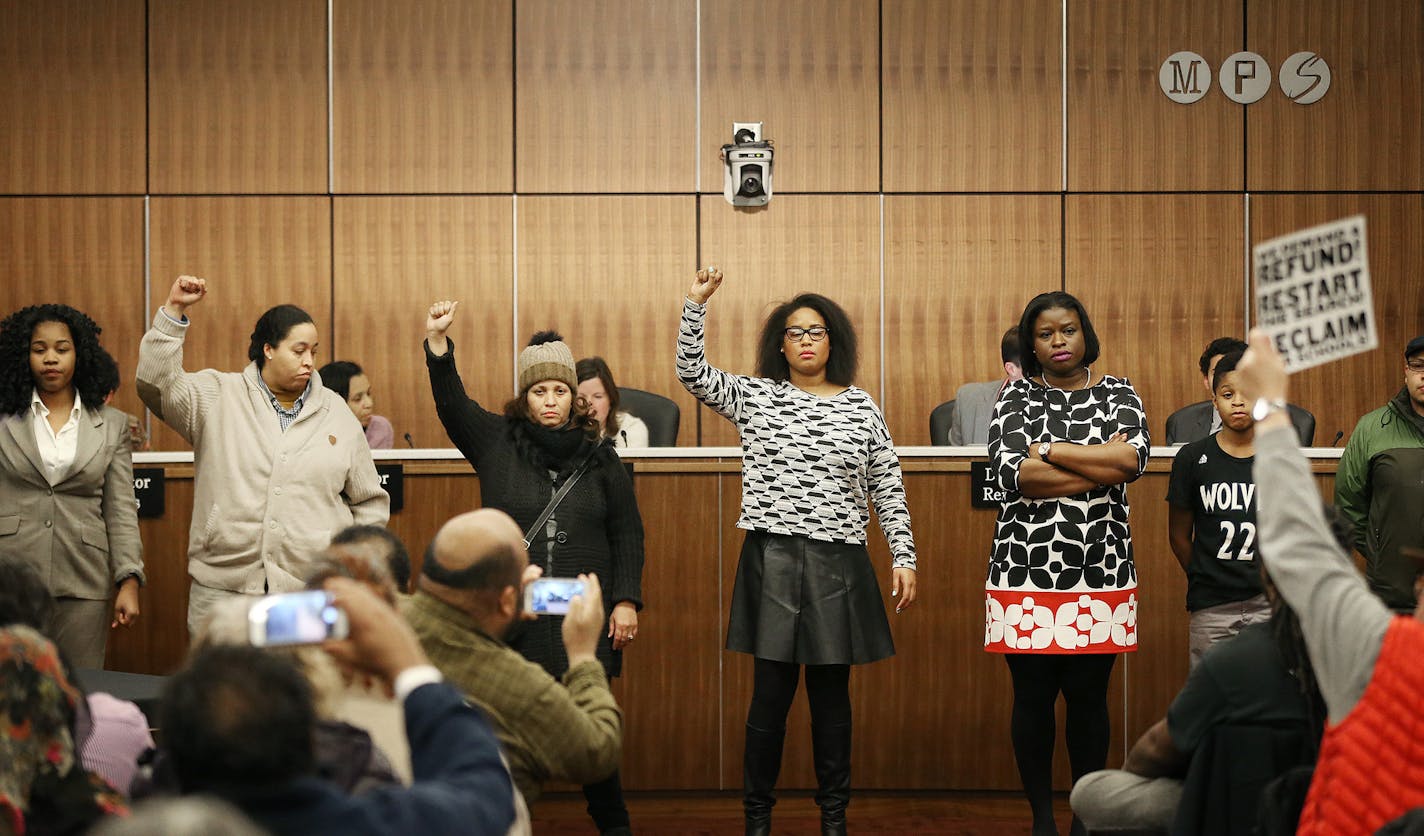 In the midst of a motion to select interim superintendent Michael Goar as the board's preferred candidate, protestors shut down the school board meeting. Tuesday January 12, 2016 in Minneapolis, MN. ] The Minneapolis school board will decide the fate of Sergio Paez, the man they selected to the lead the district. Jerry Holt/Jerry.Holt@Startribune.com ORG XMIT: MIN1601122113020553