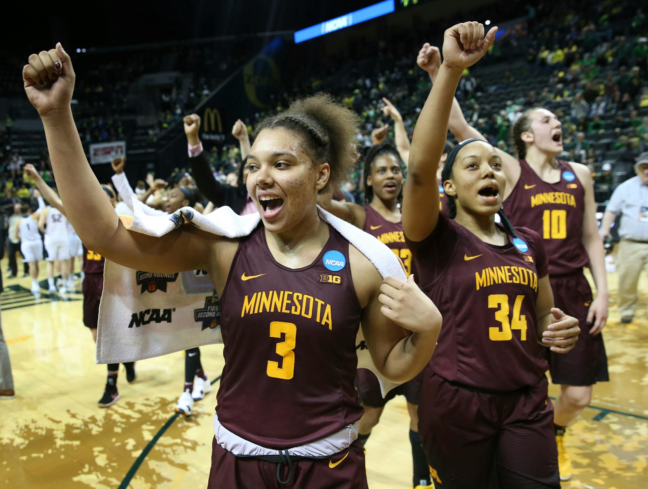 Minnesota's Destiny Pitts, Kenisha Bell, Gadiva Hubbard and Jessie Edwards, from left, celebrate the team's first-round win over Green Bay in the NCAA women's college basketball tournament in Eugene, Ore. on Friday.