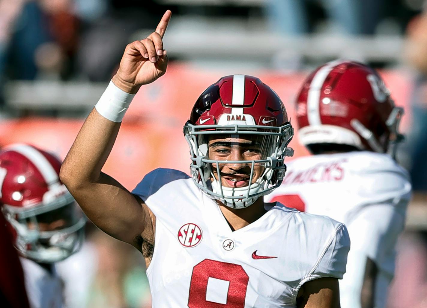 FILE - Alabama quarterback Bryce Young (9) during warm ups before the start of an NCAA college football game against Auburn on Nov. 27, 2021, in Auburn, Ala. Alabama is banking on Young and Will Anderson Jr. to lead the team back to a national championship after a tantalizingly close call last season. Both are high on the lists of preseason Heisman Trophy candidates and potential No. 1 NFL draft picks. (AP Photo/Butch Dill, File)