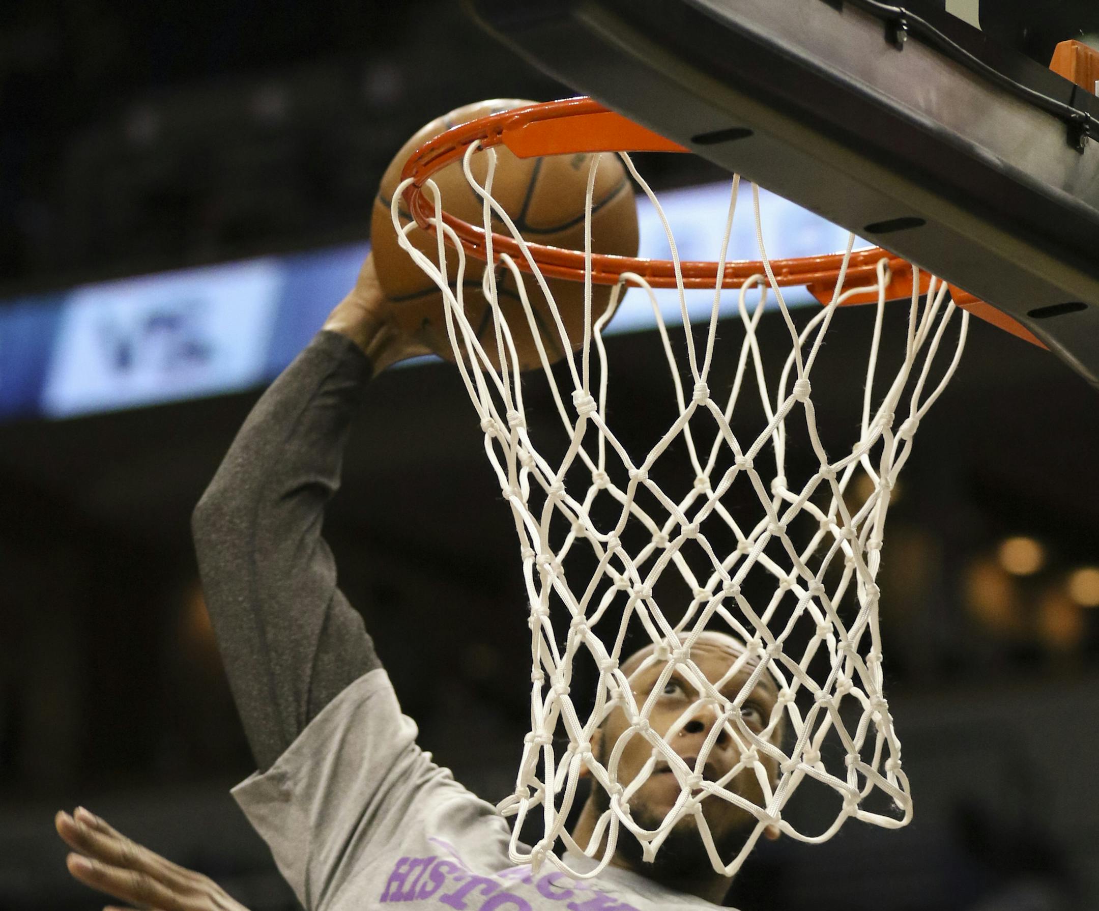 The newest Timberwolf Adrian Payne, acquired from Atlanta yesterday, warmed up before the game Wednesday night at Target Center. ] JEFF WHEELER ‚Ä¢ jeff.wheeler@startribune.com The Minnesota Timberwolves faced the Golden State Warrirors in an NBA basketball game Wednesday night, February 11, 2015 at Target Center in Minneapolis.