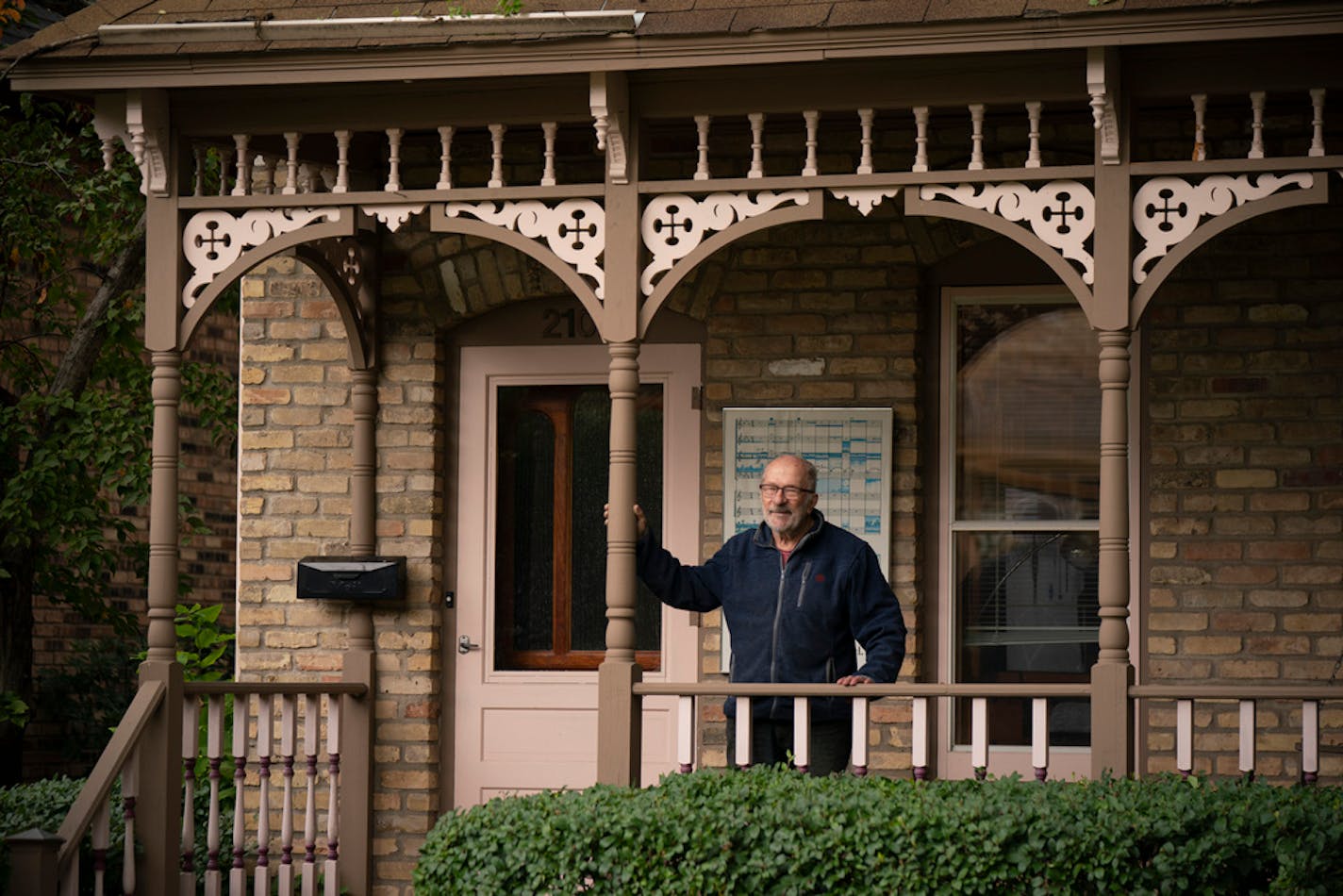 Bob Roscoe on the porch of his former house on Milwaukee Avenue in south Minneapolis.