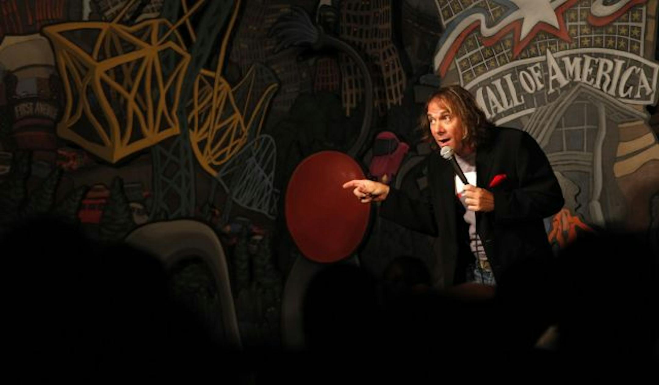 Comedian Jeff Capri entertained the crowd at the House of Comedy during the clubs opening night in the Mall of America.