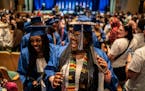 Zacaria Blair and her 2021 North Community High School graduation classmates danced their way out of the building after receiving their high school di