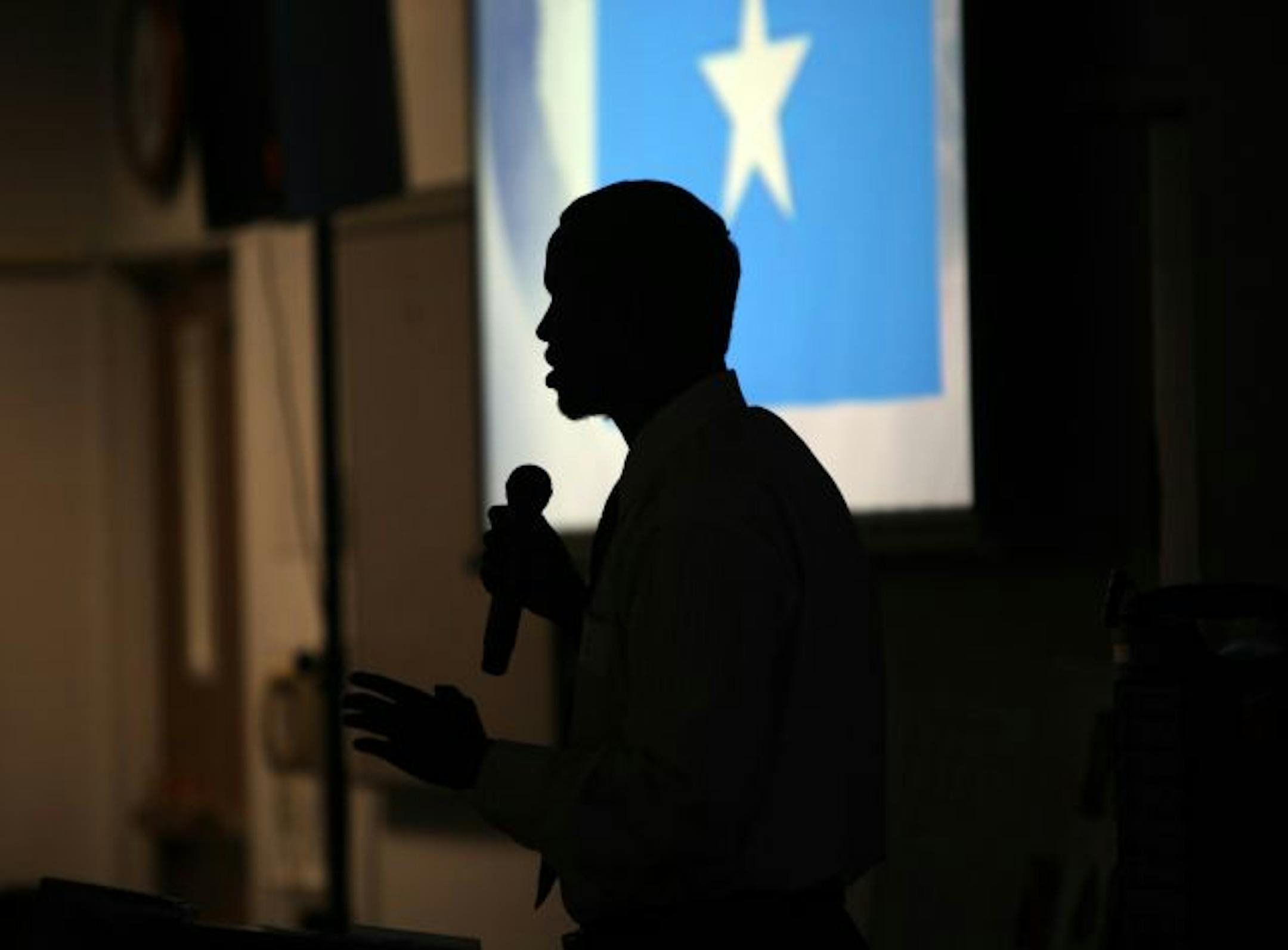 Asad Shane spoke about the Somalian flag as he talked about Somali culture to a group at the Eden Prairie Community Center Thursday.