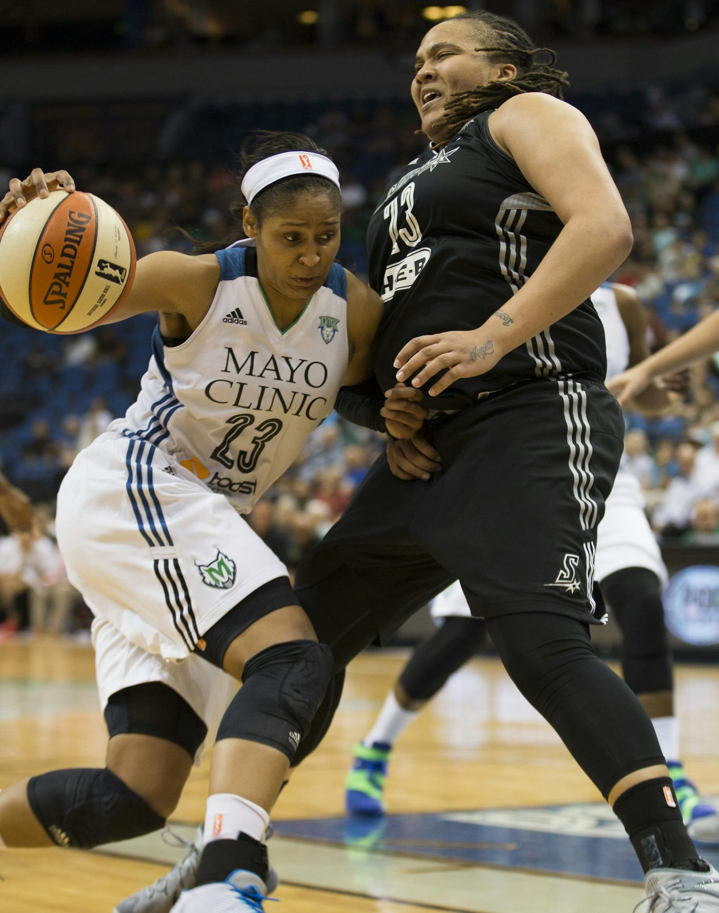 Lynx Maya Moore pushed past San Antonio's Danielle Adams in the second half. Moore score 24 points in the second half. ] RENEE JONES SCHNEIDER &#x2022; reneejones@startribune.com The Minnesota Lynx vs. the San Antonio Stars on Tuesday, August 11, 2015 at Target Center in Minneapolis, Minn.