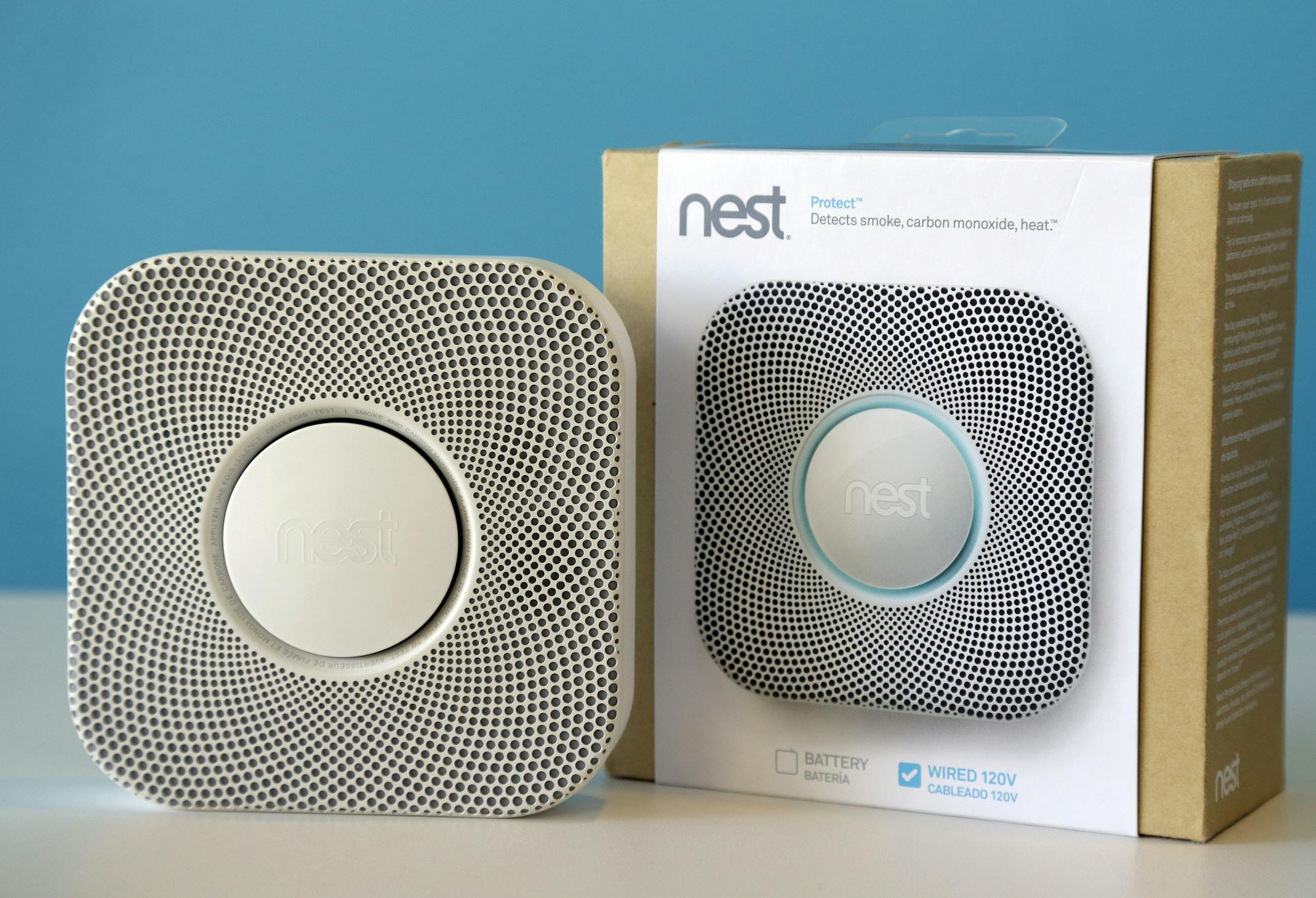 The Nest smoke and carbon monoxide alarm is shown at the company's offices on Tuesday, Oct. 1, 2013, in Palo Alto, Calif. Tony Fadell, a gadget guru who helped design the iPod and original iPhone while working at Apple, is counting on his latest innovation to prove that a smoke detector can be sleek, smart and appreciated. (AP Photo/Marcio Jose Sanchez) ORG XMIT: CAMS204