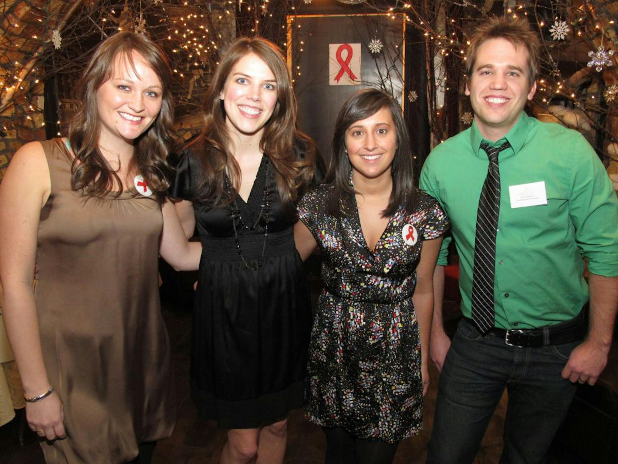 Carrie Evavold, Breanna Zarmbinski and Julie Neborak of the American Medical Student Association and Nick Boerum, development manager for One Heartland.