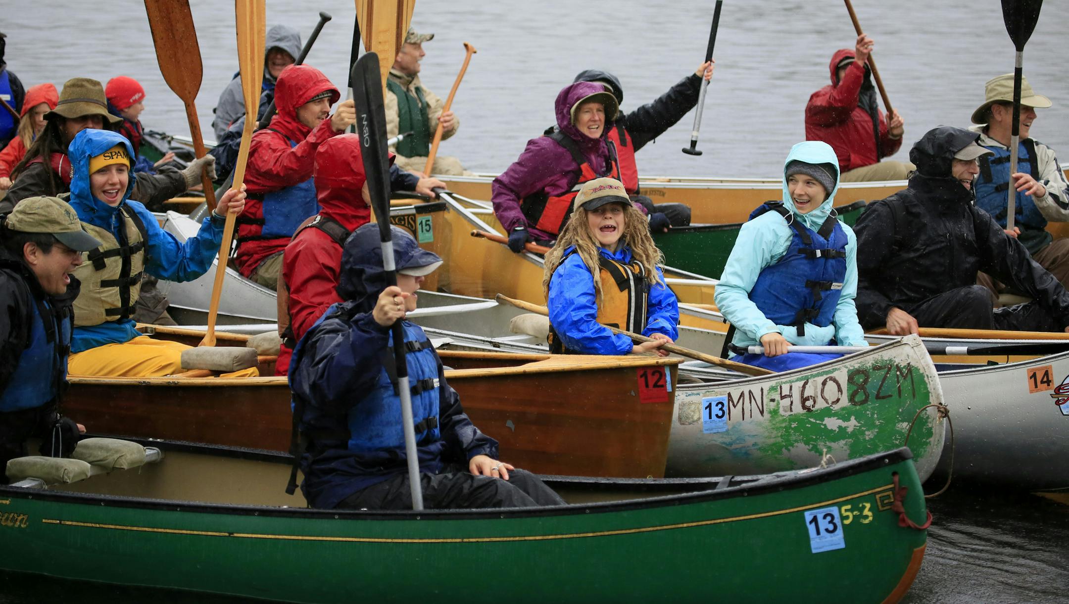 Not since the battle of 1978 to designate the BWCA as a wilderness area has the town of Ely been so divided. This time it's the possibility of Copper/Nickel mining and the promised jobs it brings -vs- the fear that mining so close to the BWCA could contaminate the water. Here,Supporters of Sustainable Ely held their Celebrate the Kawishiwi River paddle on Saturday, despite the 45 degree temp and poring rain, the event attracted about 50 paddlers. The paddle followed the grand opening of the Sust