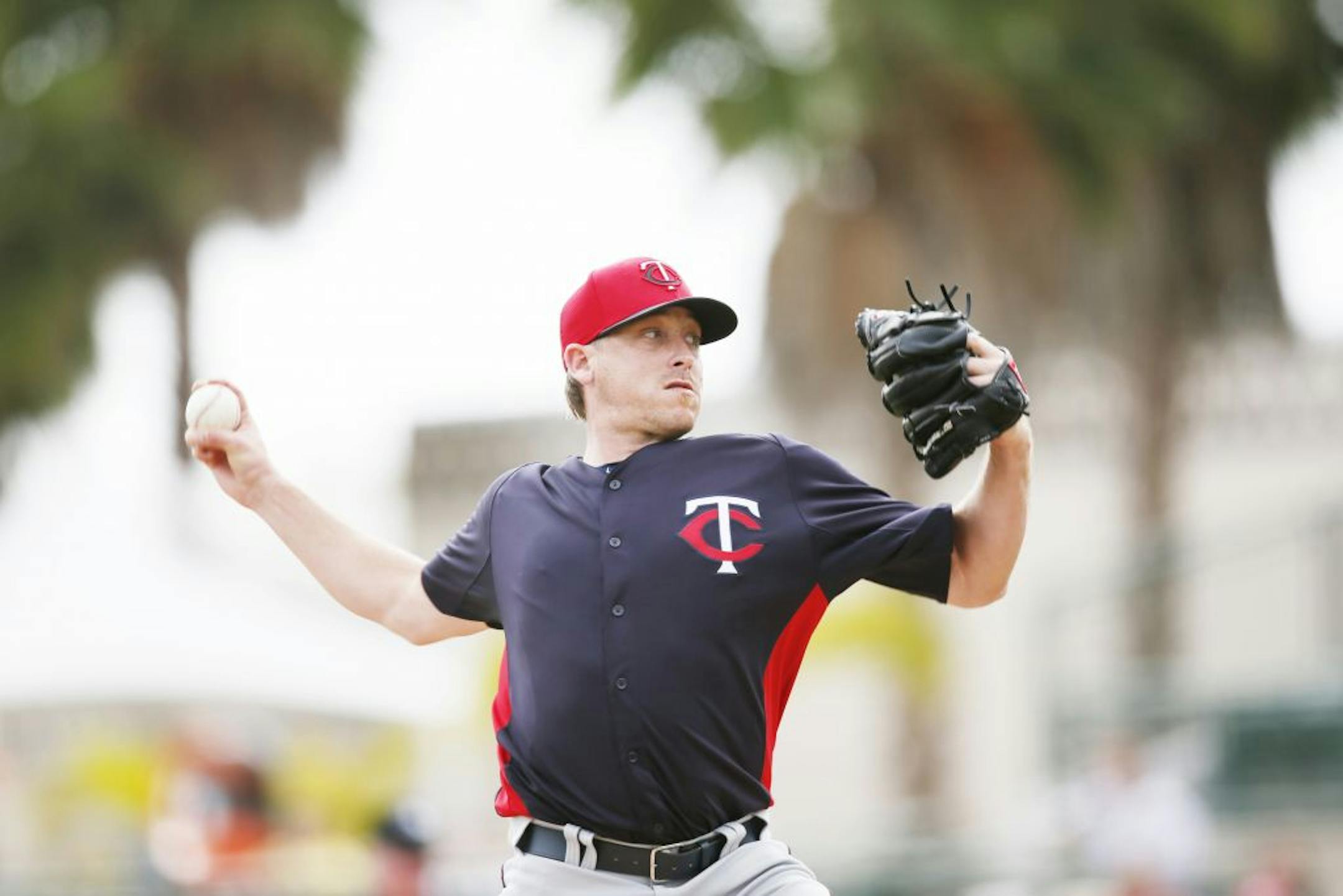 Twins pitcher Kevin Correia threw a pitch in the first inning during a spring game.