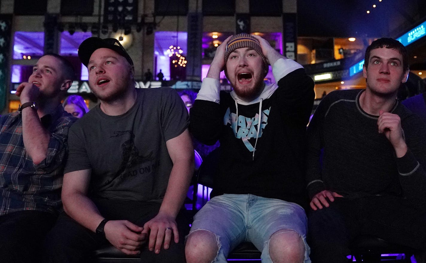 Friends, from left, Andrew Schafer, Scott Weinand, Phillip Fisher (with his hands on his head), and Abe Harder watched as the Seattle Surge played the Florida Mutineers in Call of Duty Friday night at the Armory. ] ANTHONY SOUFFLE &#x2022; anthony.souffle@startribune.com The Wilf-owned Minnesota Rokkr e-sports team competed in the first day of a three day tournament they're hosting with 12 teams from around the world playing Call of Duty in front of e-sports fans Friday, Jan. 24, 2020 at the Arm