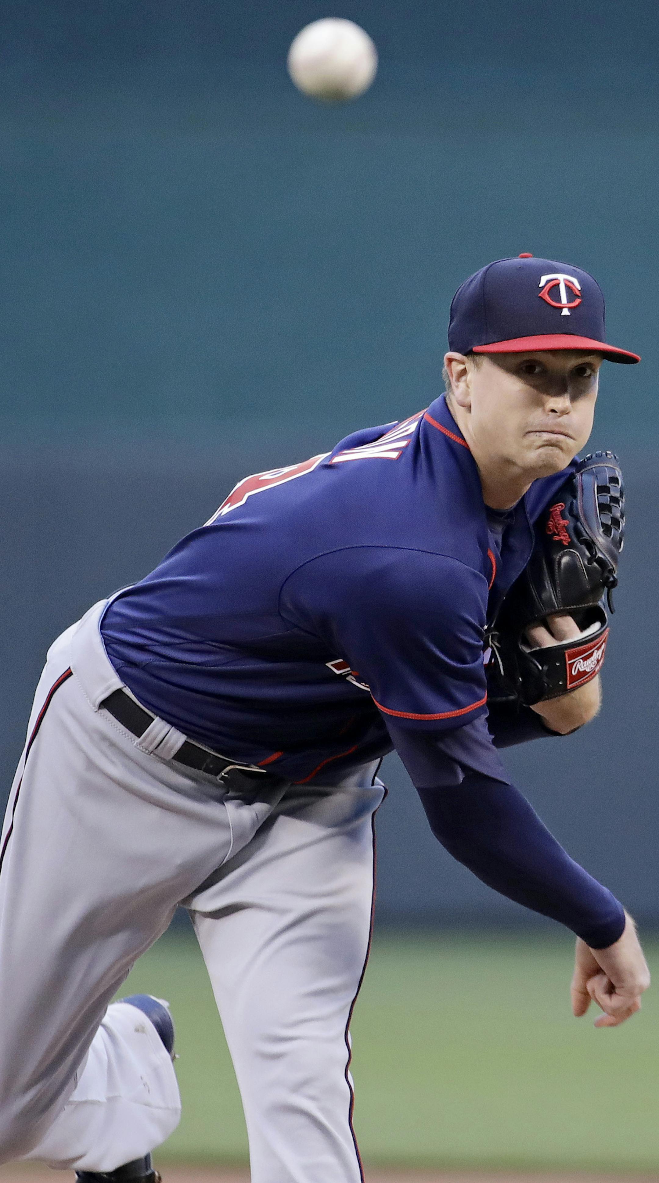 Minnesota Twins starting pitcher Kyle Gibson throws during the first inning of a baseball game against the Kansas City Royals Friday, April 28, 2017, in Kansas City, Mo. (AP Photo/Charlie Riedel)