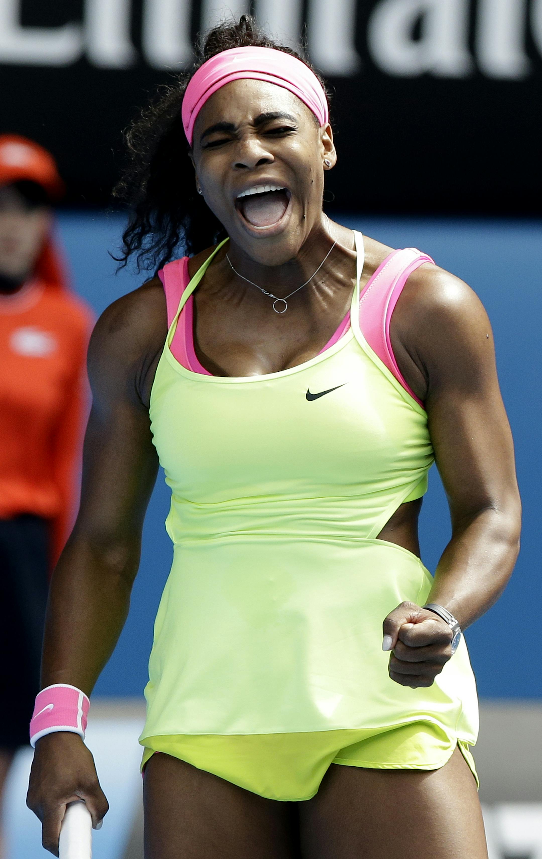 Serena Williams, of the U.S., yells during her semifinal match against compatriot Madison Keys at the Australian Open tennis championship in Melbourne, Australia, Thursday, Jan. 29, 2015. (AP Photo/Lee Jin-man)