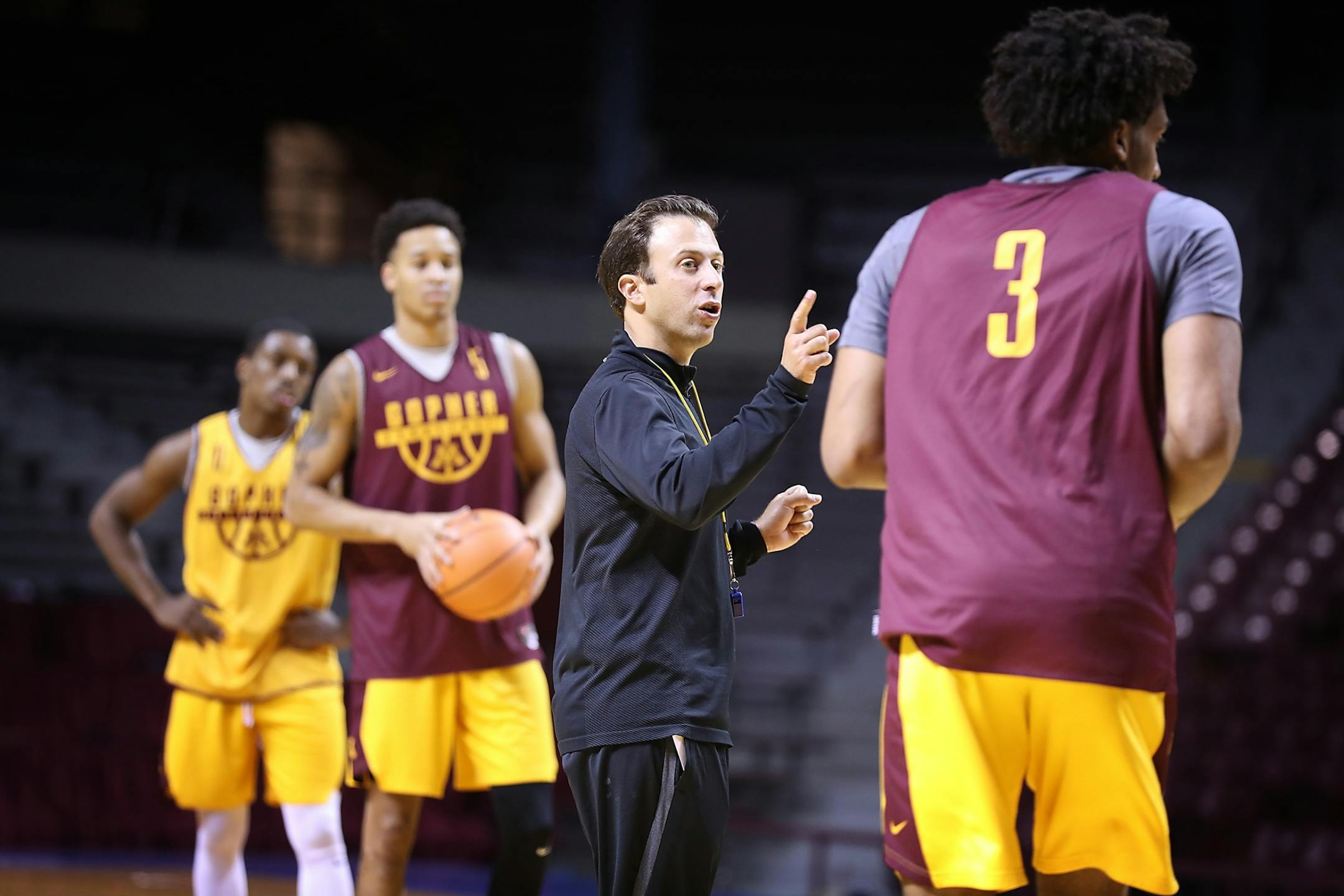 Richard Pitino leads a Gophers practice.