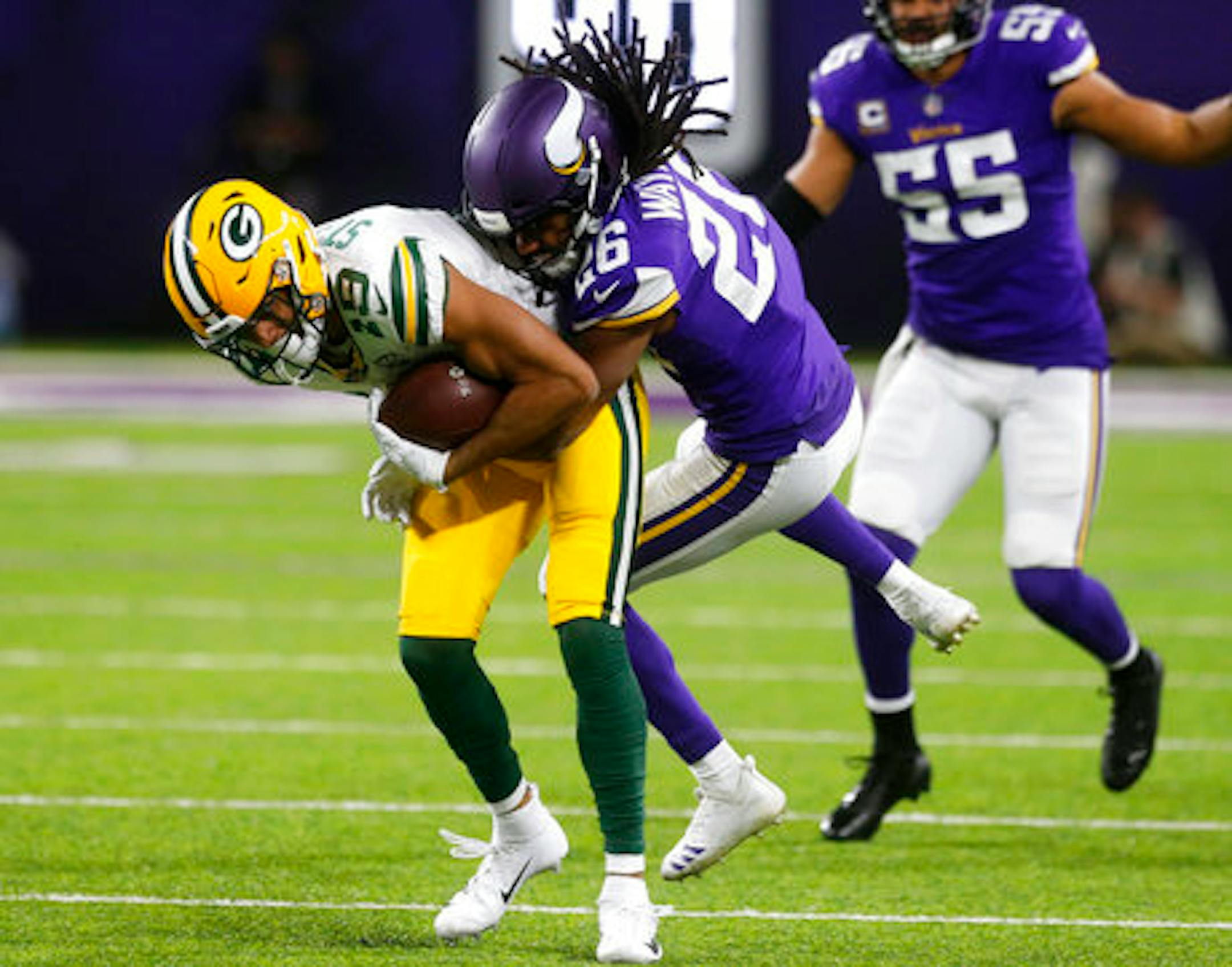 Green Bay Packers wide receiver Equanimeous St. Brown is tackled by Minnesota Vikings cornerback Trae Waynes (25) after making a reception during the first half of an NFL football game Sunday, Nov. 25, 2018, in Minneapolis. (AP Photo/Jim Mone)