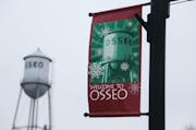 A holiday banner is seen along Central Avenue in downtown Osseo on Dec. 18, 2014.