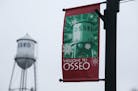 A holiday banner is seen along Central Avenue in downtown Osseo Thursday, Dec. 18, 2014, in Osseo, MN.