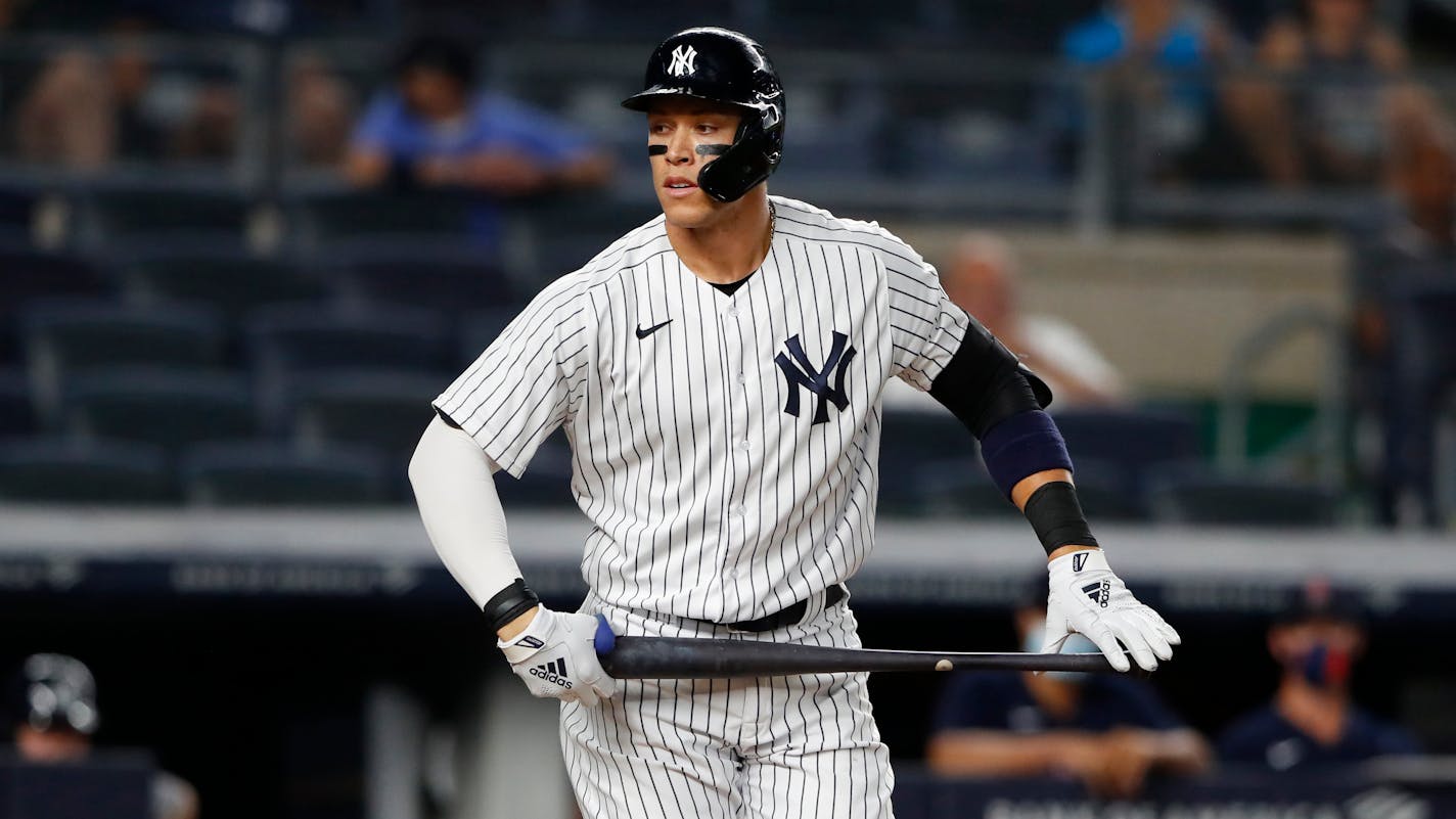 New York Yankees right fielder Aaron Judge tosses his bat after a walk against the Boston Red Sox during the inning of a baseball game. Saturday, June 5, 2021, in New York. (AP Photo/Noah K. Murray)