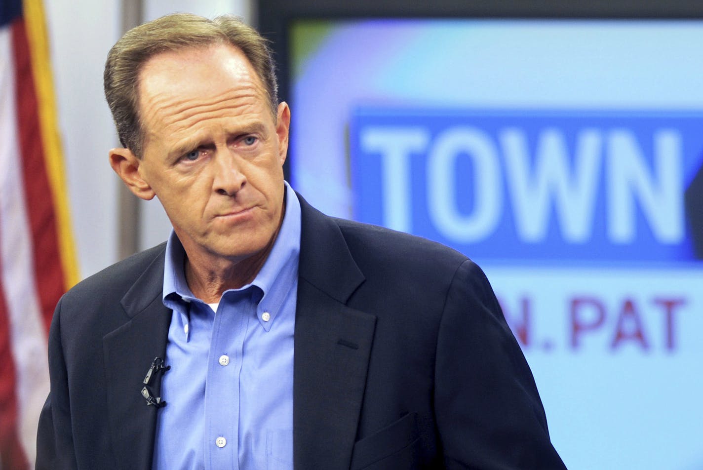 Sen. Pat Toomey holds a town-hall meeting at the WLVT / PBS 39-TV studios, Thursday, Aug. 31, 2017 in Bethlehem, Pa. Pennsylvania U.S. Sen. Pat Toomey predicts Congress will move quickly on an emergency aid package for victims of Hurricane Harvey when lawmakers return from their August recess next week. (Tom Gralish/The Philadelphia Inquirer via AP)