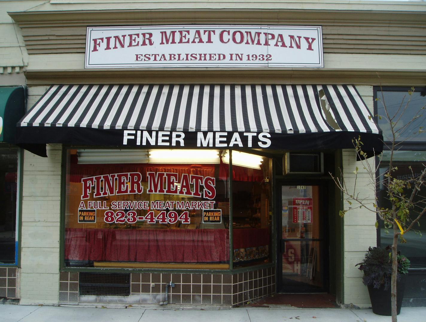 This is a photo of Finer Meat Company before the owner spruced up the facade. A grant reimbursement from the city helped brighten up the storefront of Tim Knopik's 53-year-old meat market in 2012.