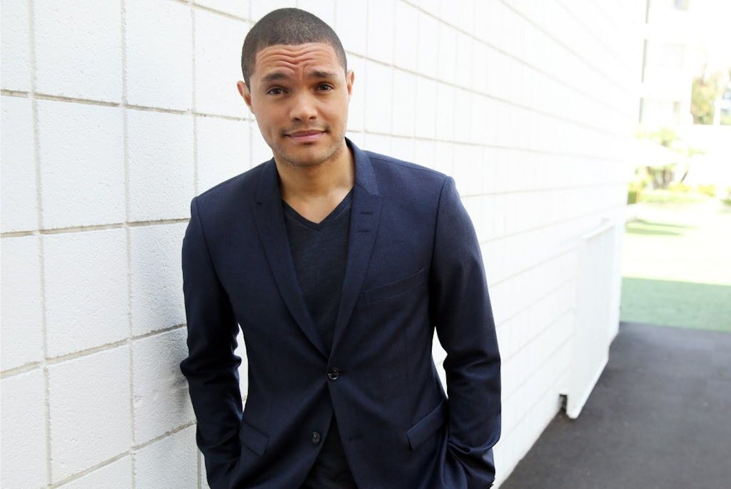 FILE - In this July 29, 2015, file photo, Trevor Noah, host of the new "The Daily Show with Trevor Noah," poses for a portrait in Beverly Hills, Calif. The show will premiere on Monday, Sept. 28, on Comedy Central.