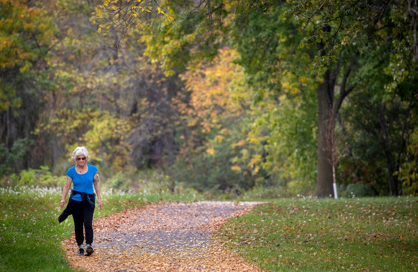 Linda Komarek hit Maplewood's Keller Regional Park on Thursday for her daily walk. Ensuring that park policies align with community needs and promote health and well-being is critical, said Ramsey County Board Chair Toni Carter.&nbsp;