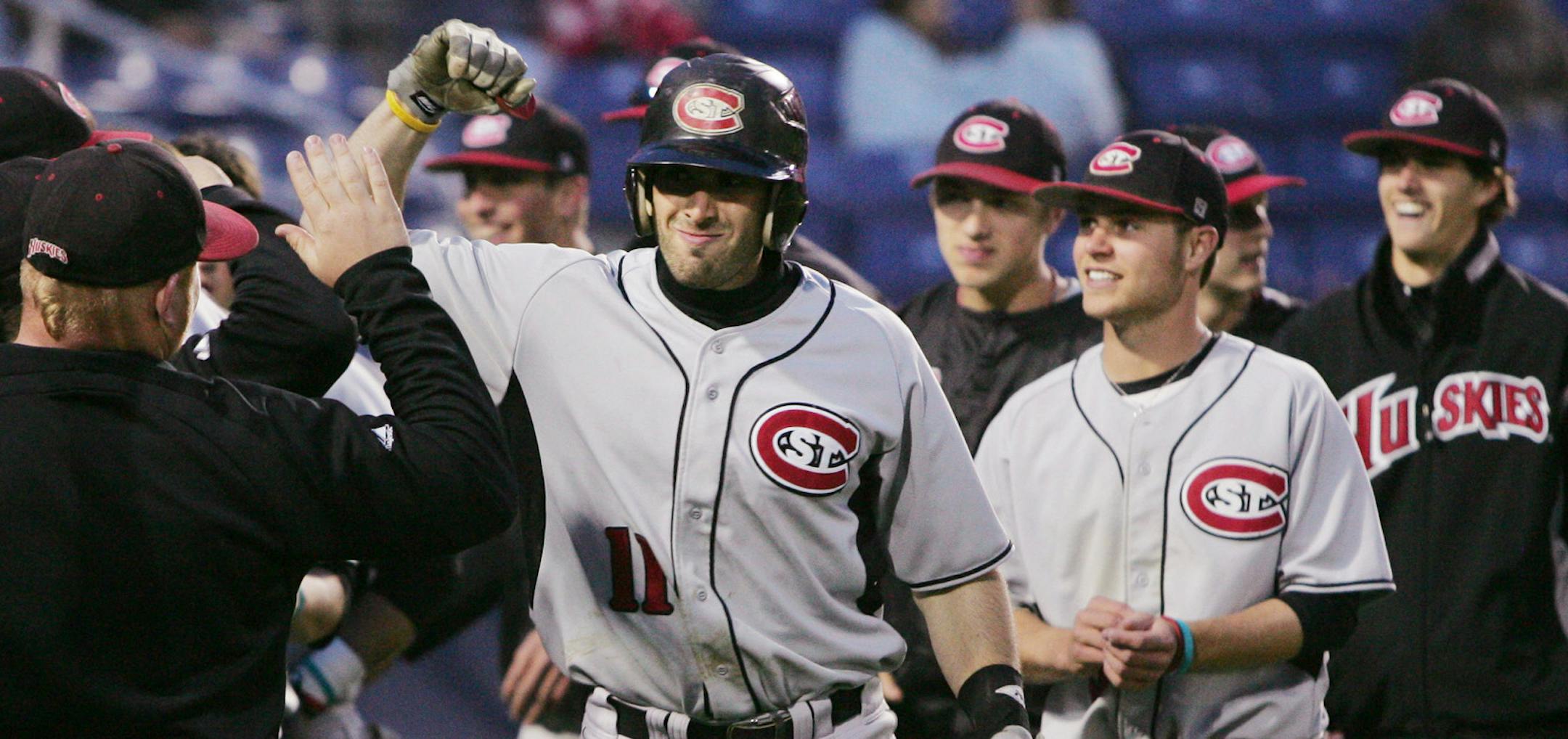 FILE - In this May 13, 2010 file photo, St. Cloud State third-baseman Sam Radbil celebrates after hitting a two-run home run during the Division II Central Regional NCAA baseball championship tournament in Farmington, N.M. A Minnesota state university system banned its athletic teams from traveling to tournaments in North Carolina, which passed a law that opponents say can allow discrimination against LGBT people. Most of the schools in that system are Division II or III schools; the University