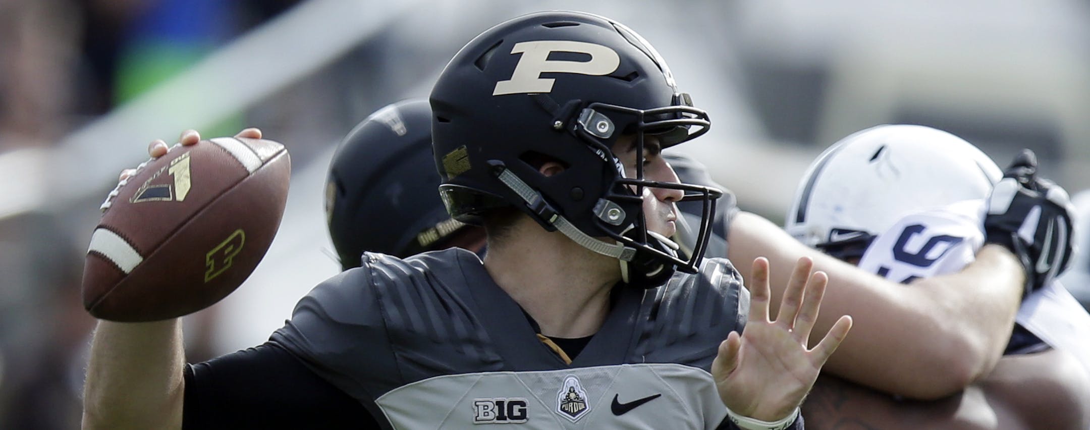 Purdue quarterback David Blough (11) throws against Penn State during the first half of an NCAA college football game in West Lafayette, Ind., Saturday, Oct. 29, 2016. (AP Photo/Michael Conroy) ORG XMIT: INMC105