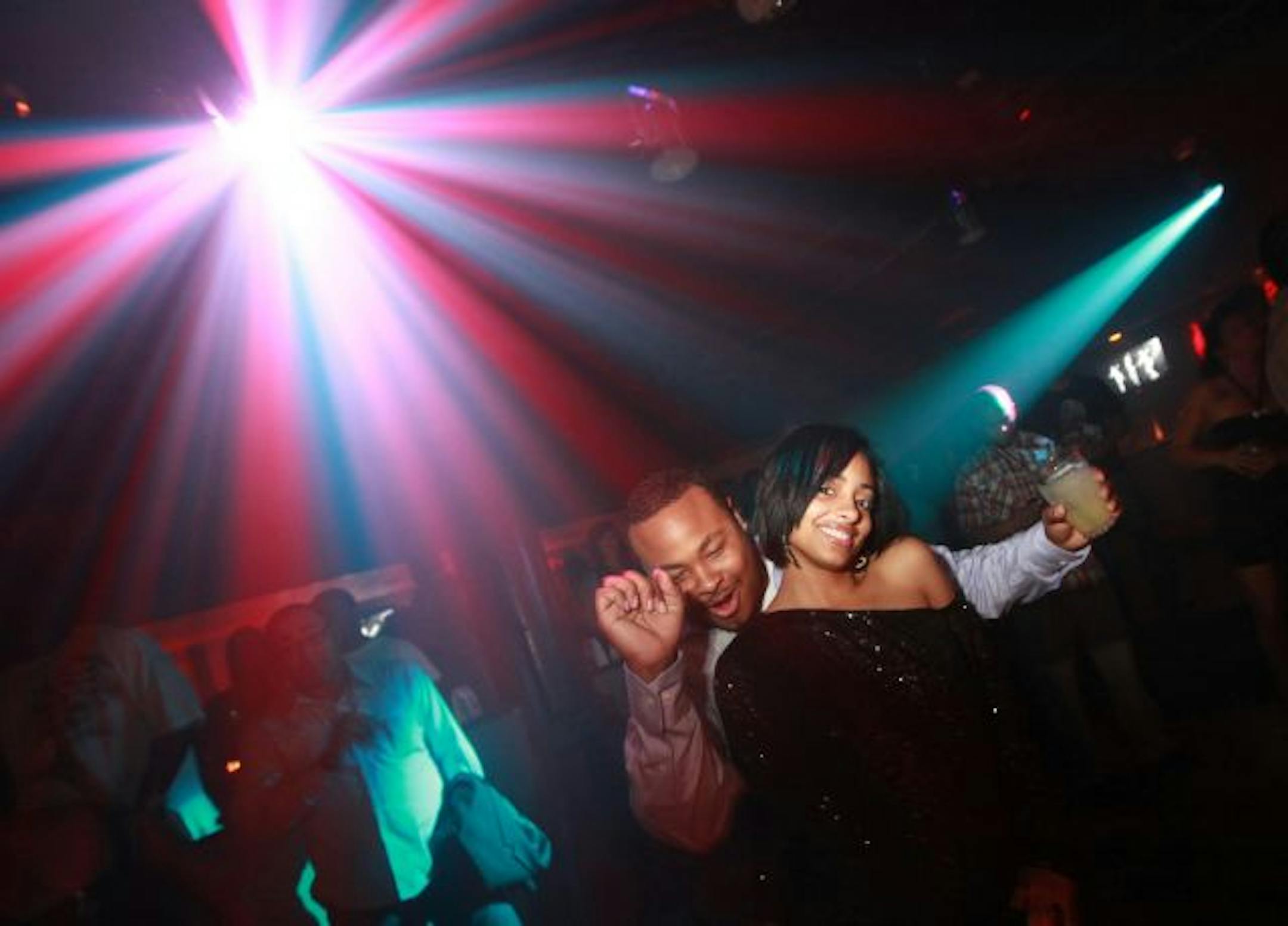 At Club New York: On the dance floor Quiton Bonds and Latrice Montgomery.