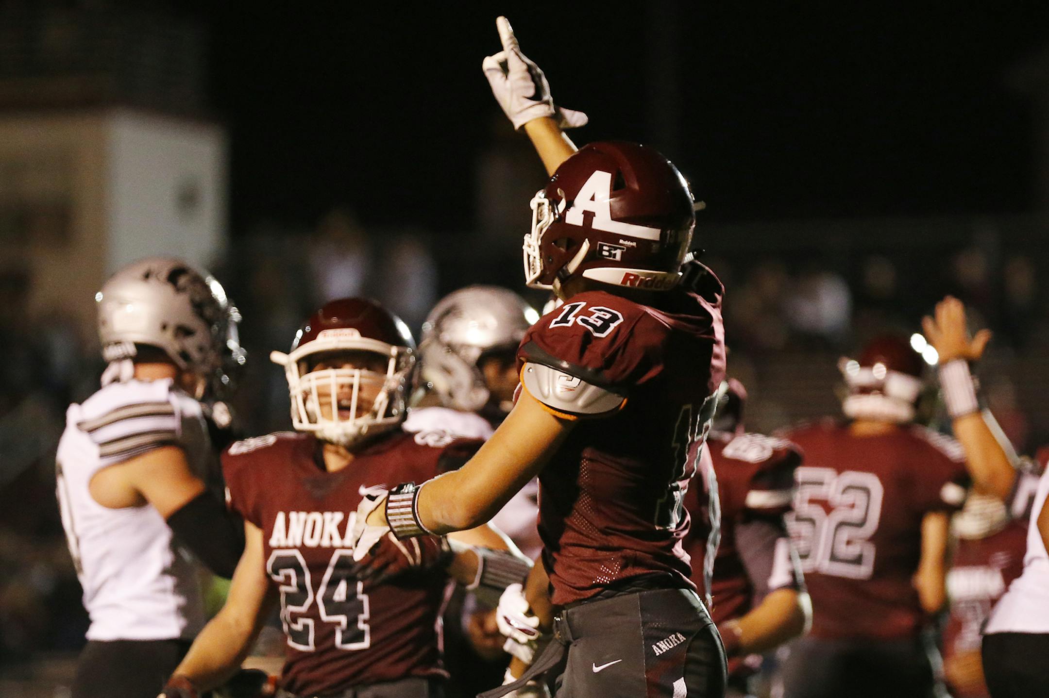 Anoka High School Cody Lindenberg (13) celebrates scoring his team's lone touchdown during the second half. ] LEILA NAVIDI &#x2022; leila.navidi@startribune.com BACKGROUND INFORMATION: Roseville Area High School plays against Anoka High School in the opening football game of the season in Anoka on Thursday, August 30, 2018. Roseville Area High School won the game 22-7. ORG XMIT: MIN1808302153160320