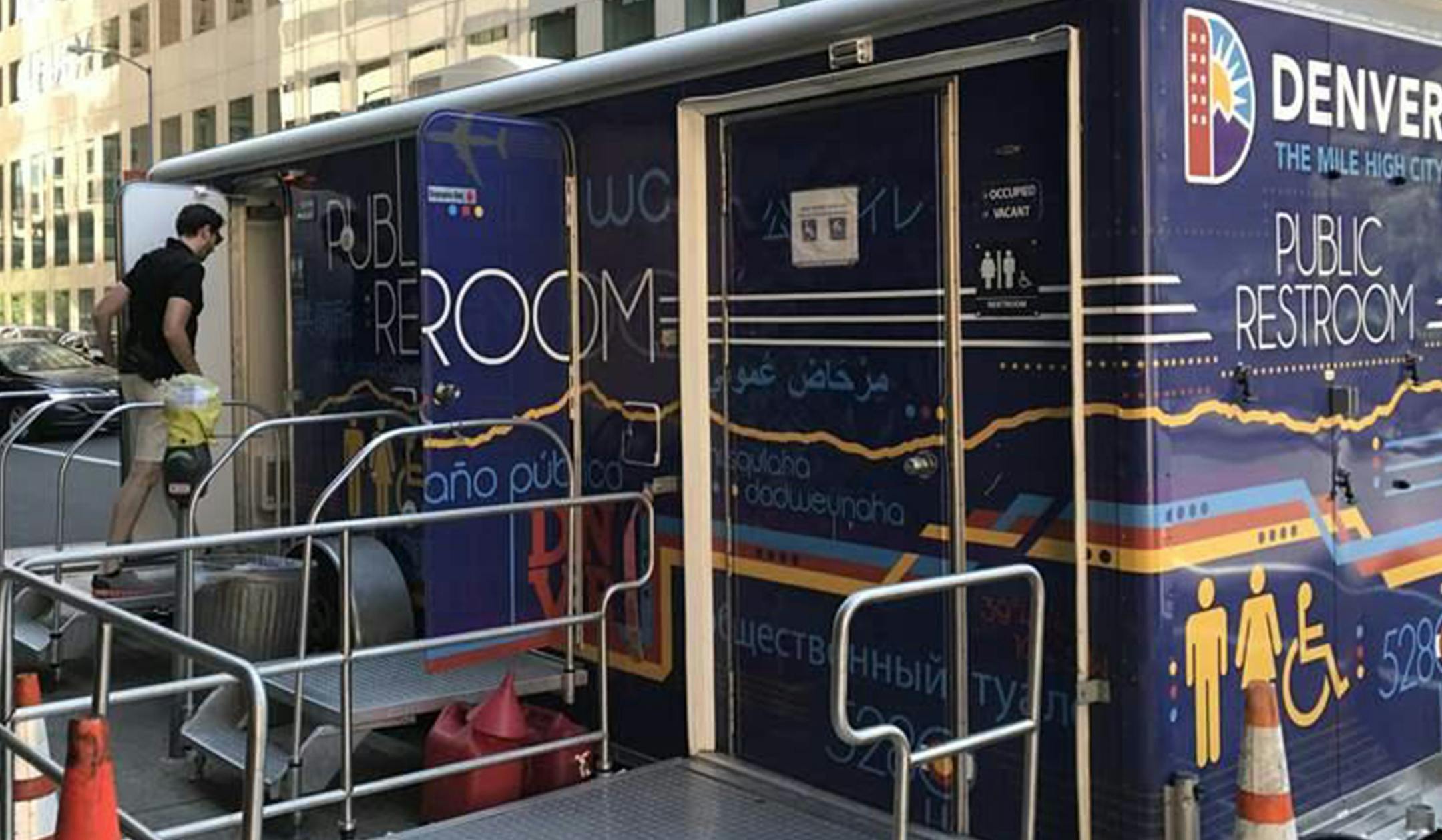 A man enters a mobile restroom in downtown Denver. City officials hope the bathrooms will make the urban core cleaner and more inviting. (Sarah Breitenbach/The Pew Charitable Trusts)