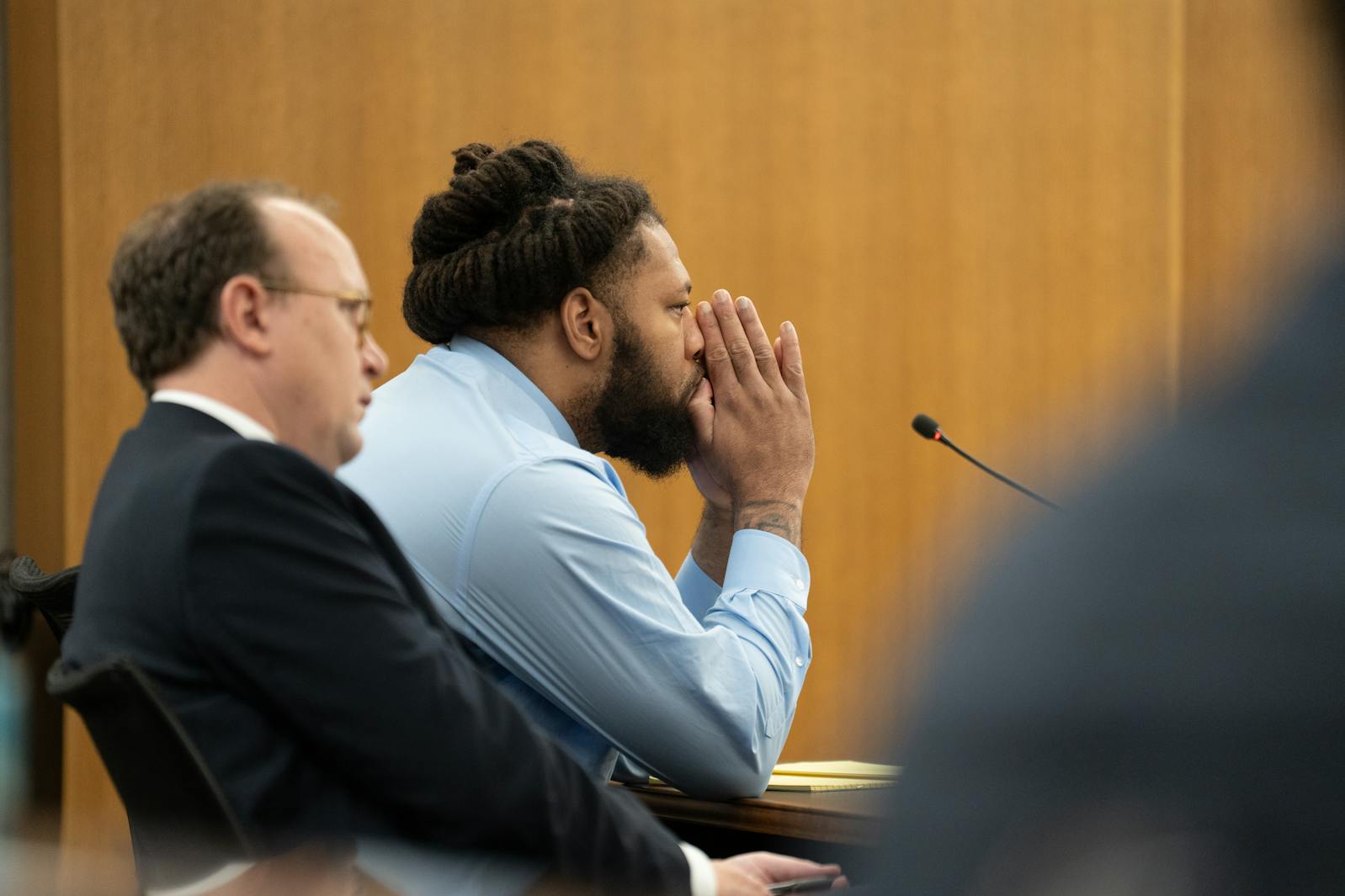 Derrick Thompson listens during the third day of his trial on June 2.