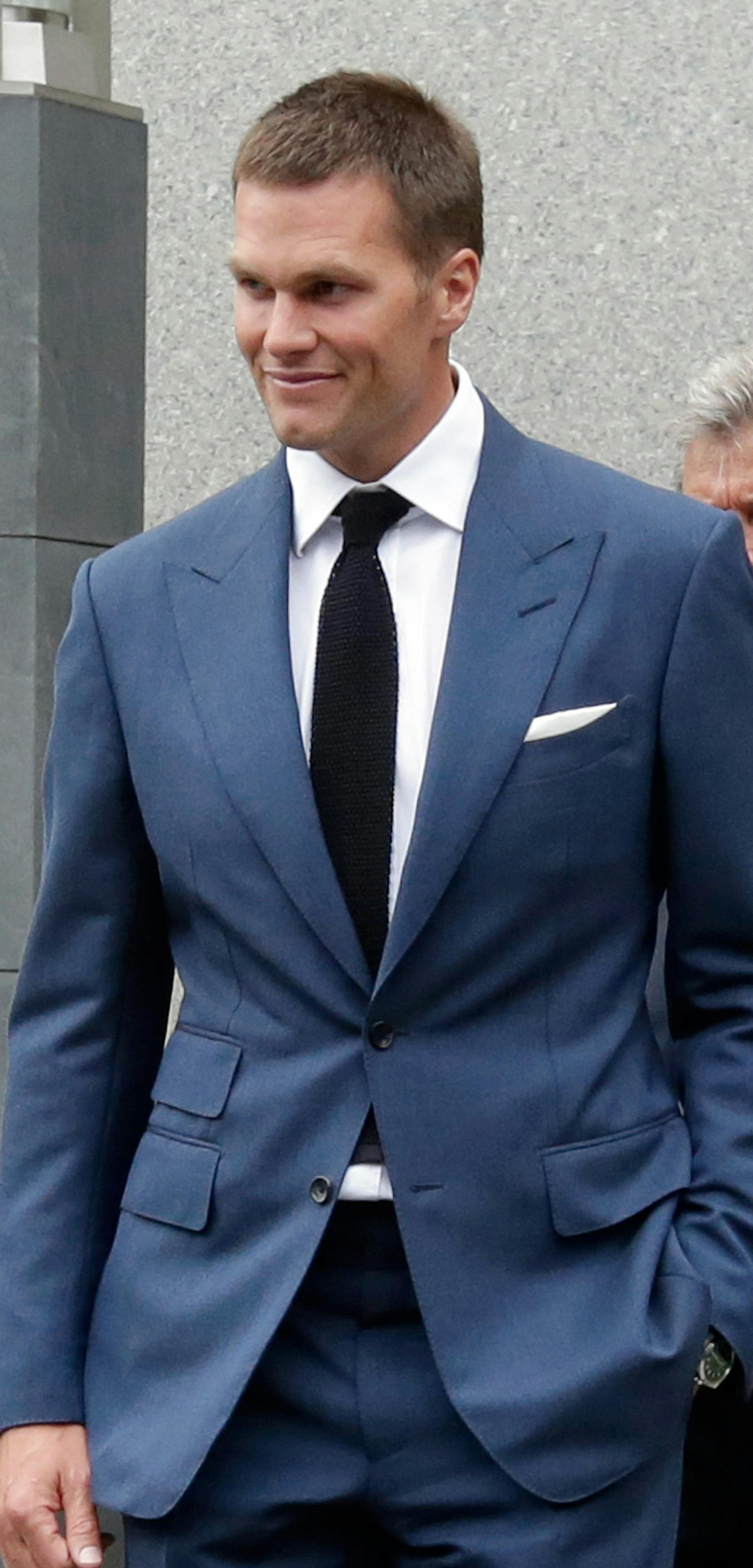 New England Patriots quarterback Tom Brady leaves Federal court, in New York, Monday, Aug. 31, 2015. (AP Photo/Richard Drew)
