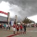 Storms roll into the area, delaying the start of an MLS soccer match between Minnesota United and FC Dallas in Frisco, Texas, Saturday, Aug. 18, 2018.