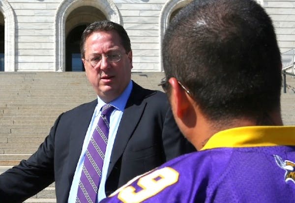 Vikings vice president Lester Bagley shook the hands of Vikings fans in front of the Capitol.